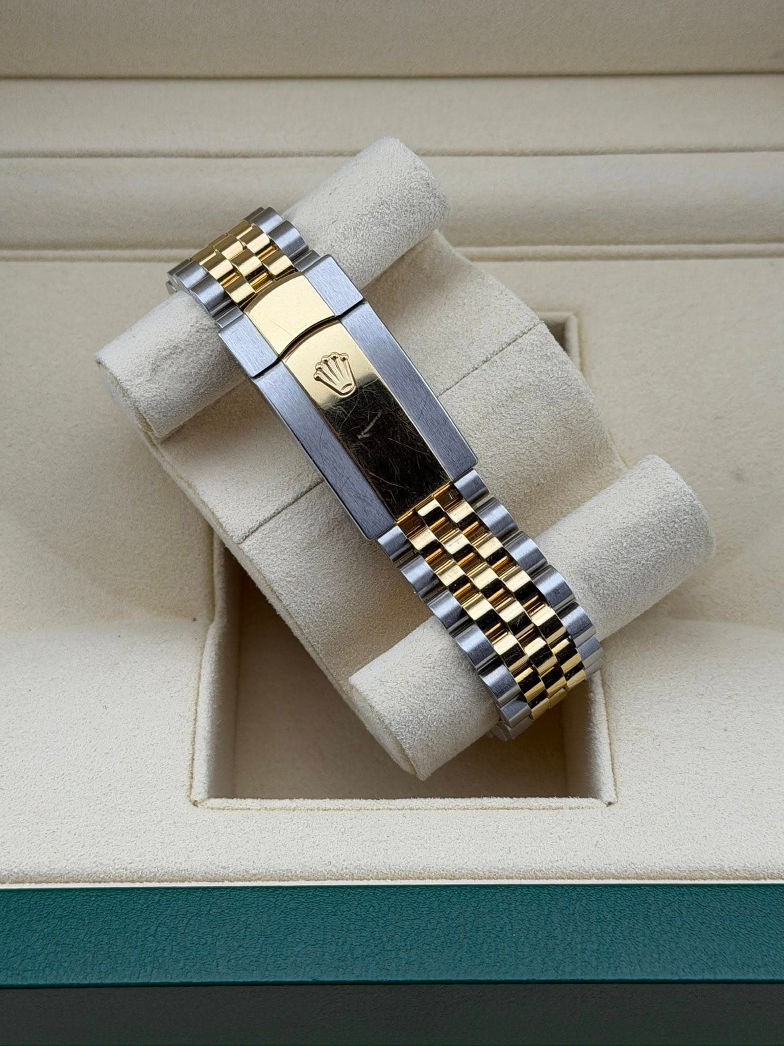 May be an image of jewelry and wrist watch