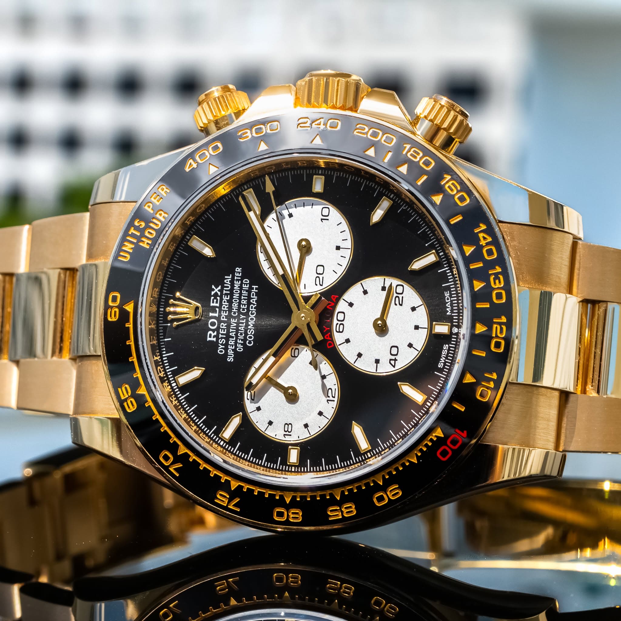 May be an image of wrist watch and text