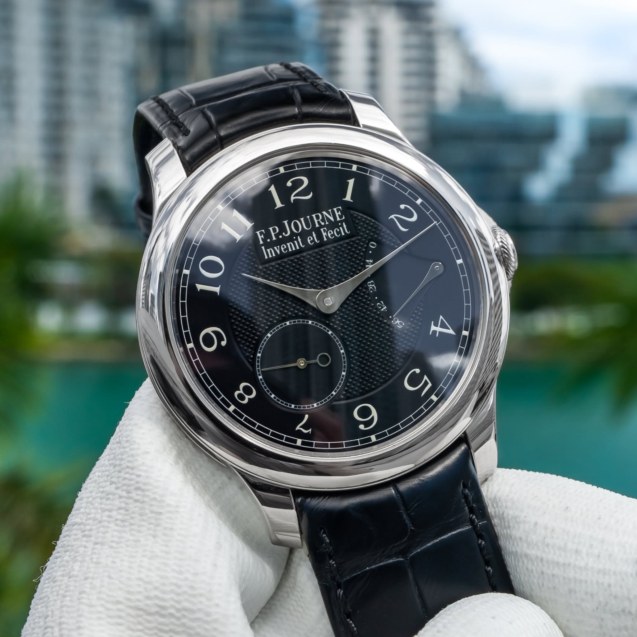 May be an image of wrist watch and text that says '- 12 1 F.P.JOURNE Invenitet.Fecit Fecit Invenit 2 O 10 0 5 9 X မ 4 ထ 女美 EXXY く C 9'