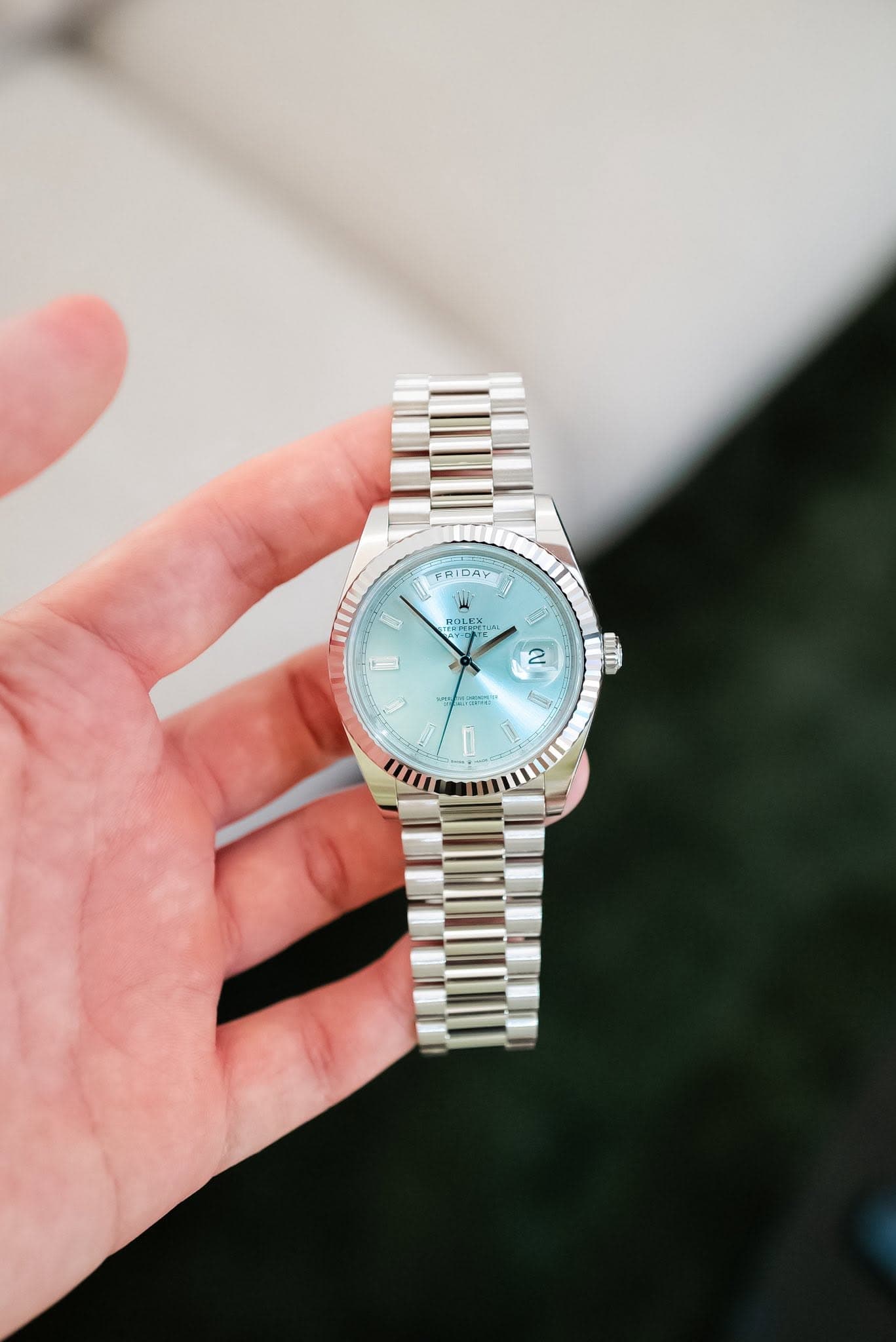 May be an image of wrist watch and text