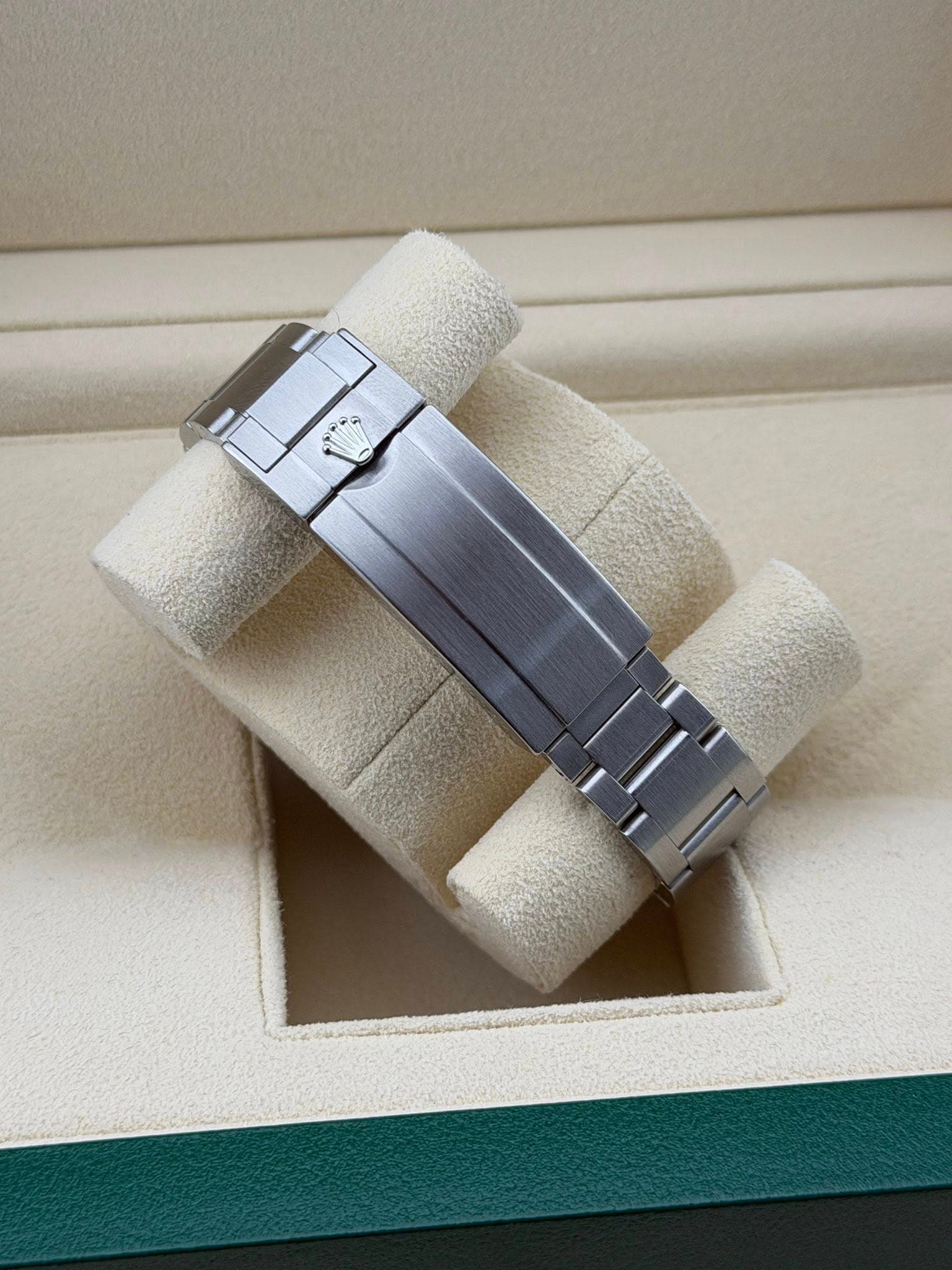 May be an image of wrist watch and text