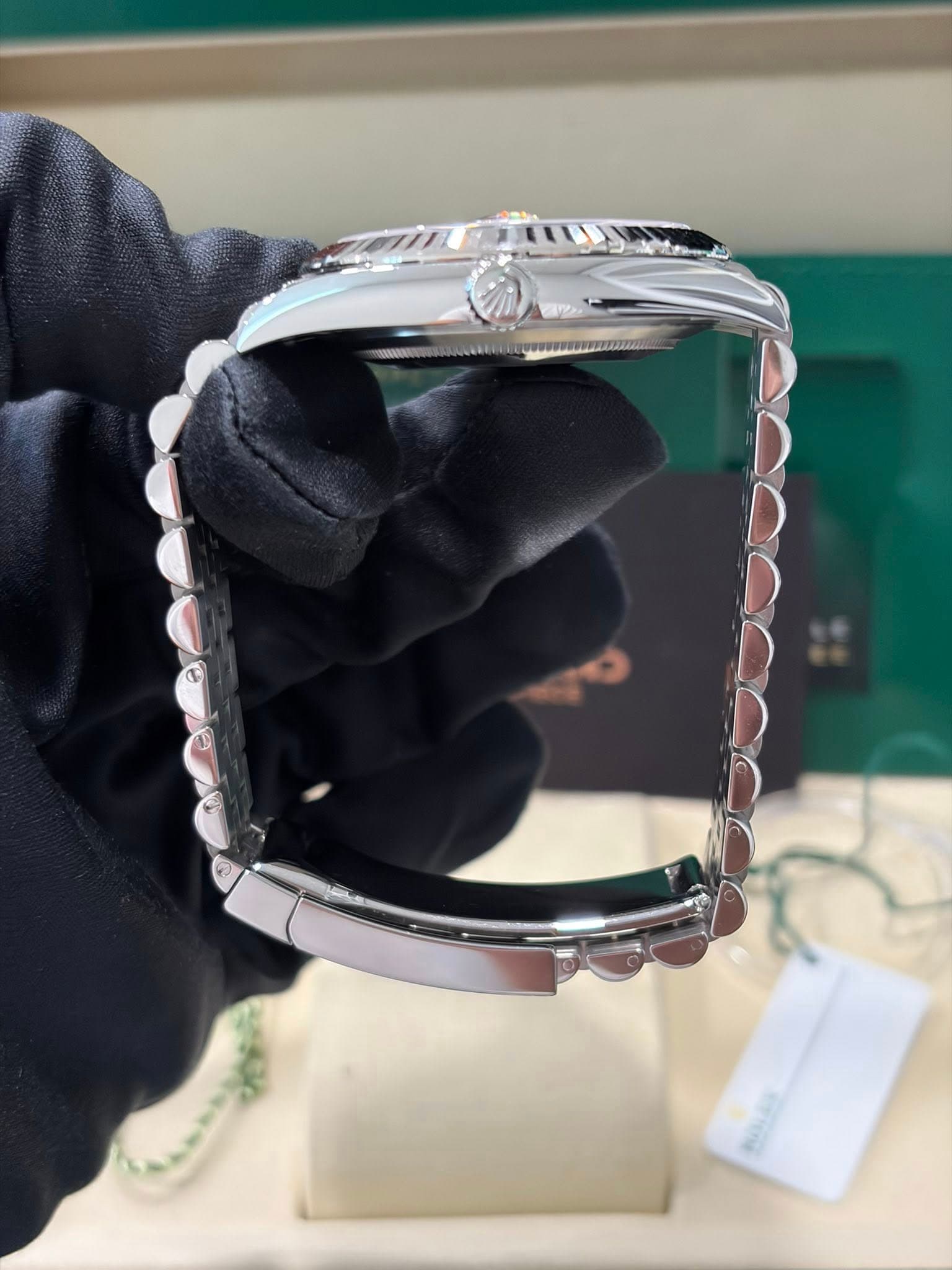 May be an image of wrist watch and jewelry