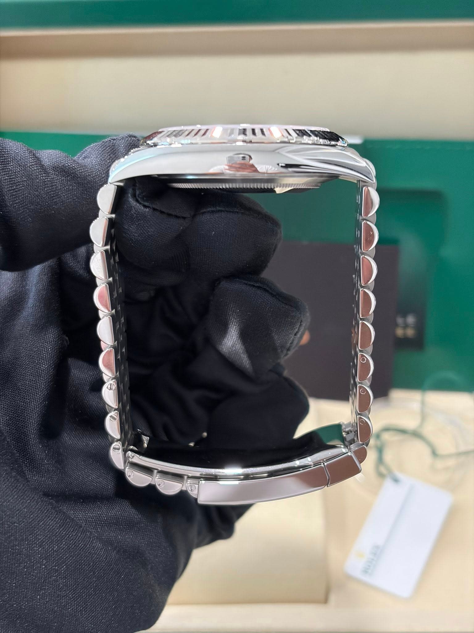 May be an image of wrist watch and text