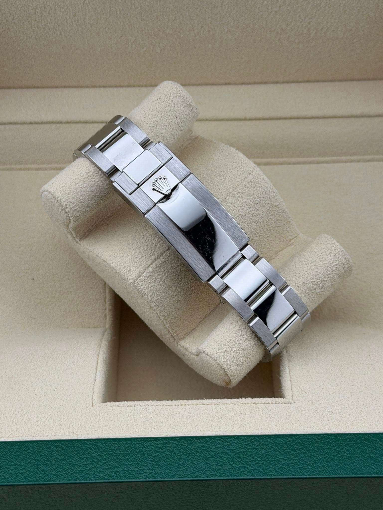 May be an image of wrist watch and ring