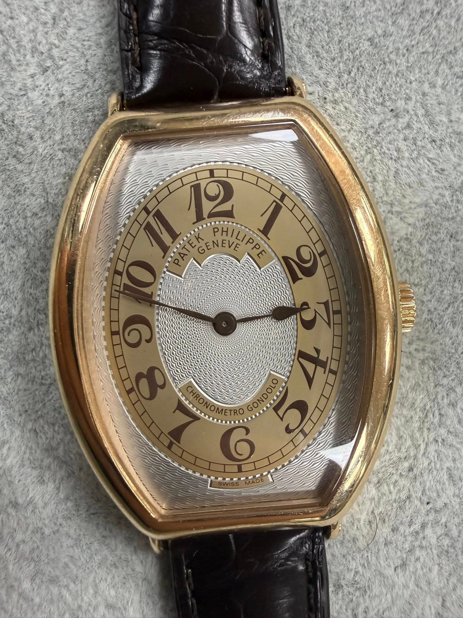 May be an image of wrist watch and text that says 'h 12 PREG GENEVEPPE ৩ GENEVE PHILIPPE PHILIL O G GONDOLO 5'