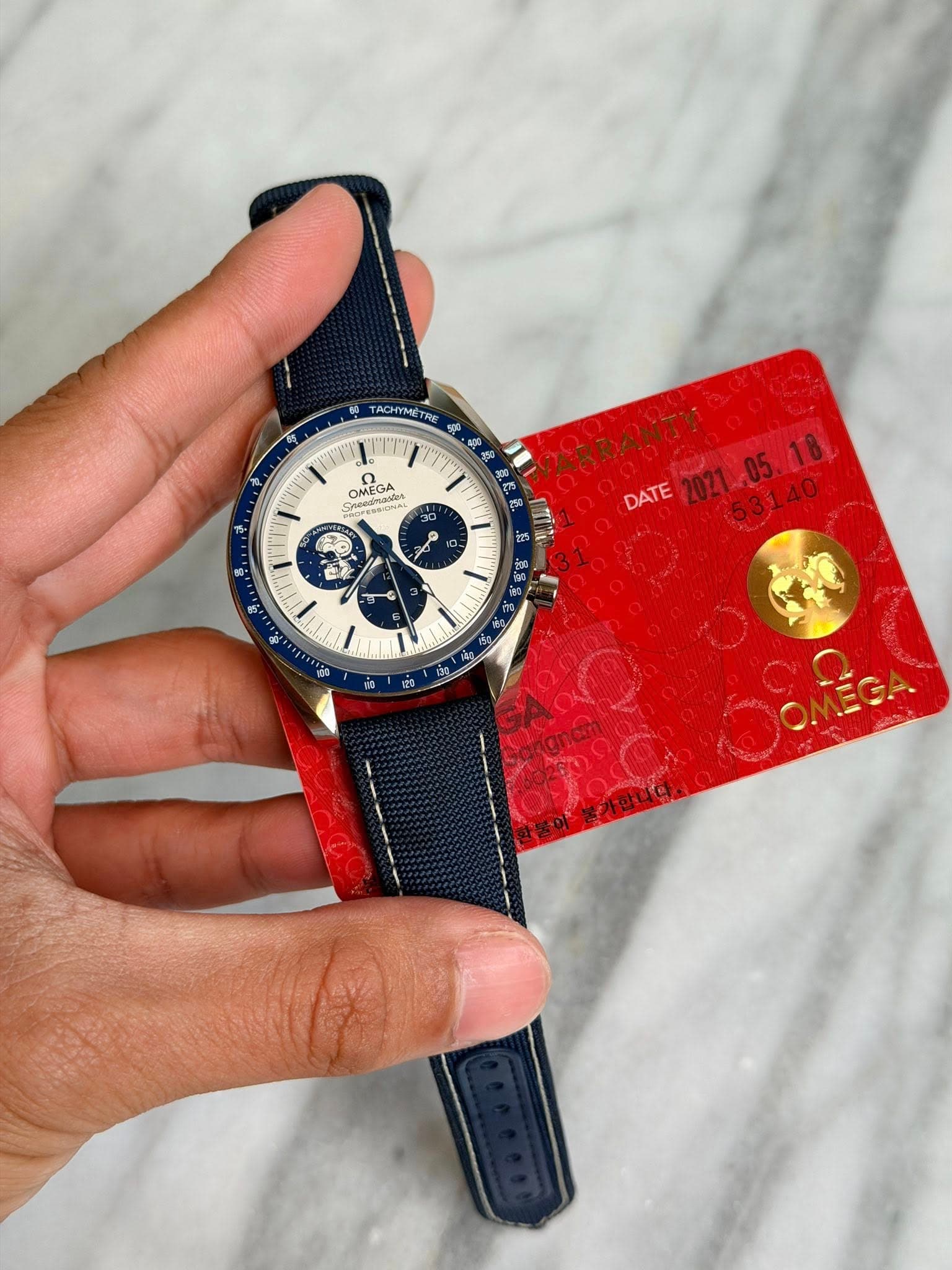 May be an image of wrist watch and text that says 'OMEGA SMie Cecesinases ea OMEGA Σε 구 0 や TaCHyMET RE ្ង 年 WARR ARRANTY DATE AИTи E 31 魚品 E 20 10 분가합니다.'