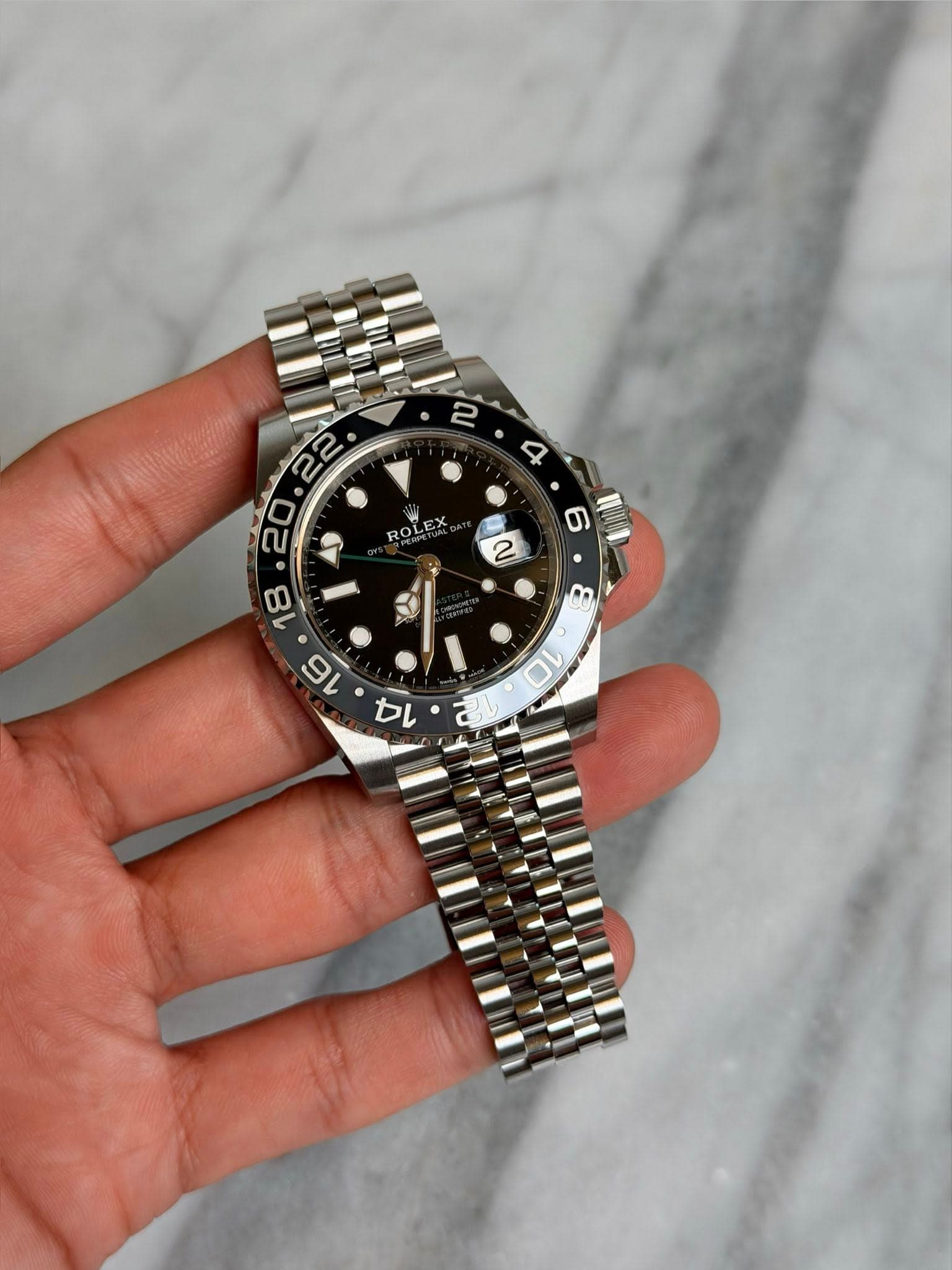 May be an image of wrist watch and text that says ' ROLEX 18 16 2'
