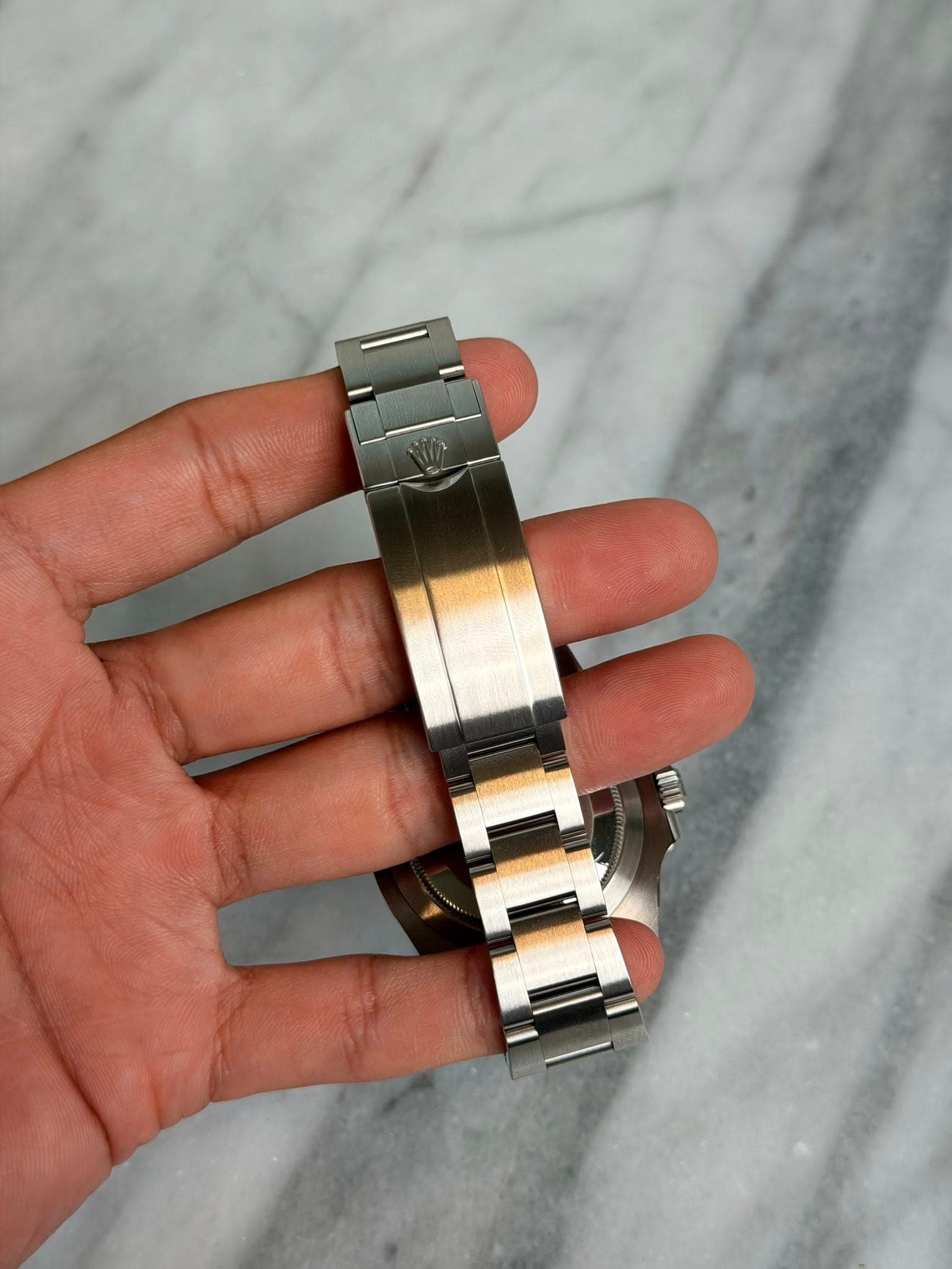 May be an image of wrist watch