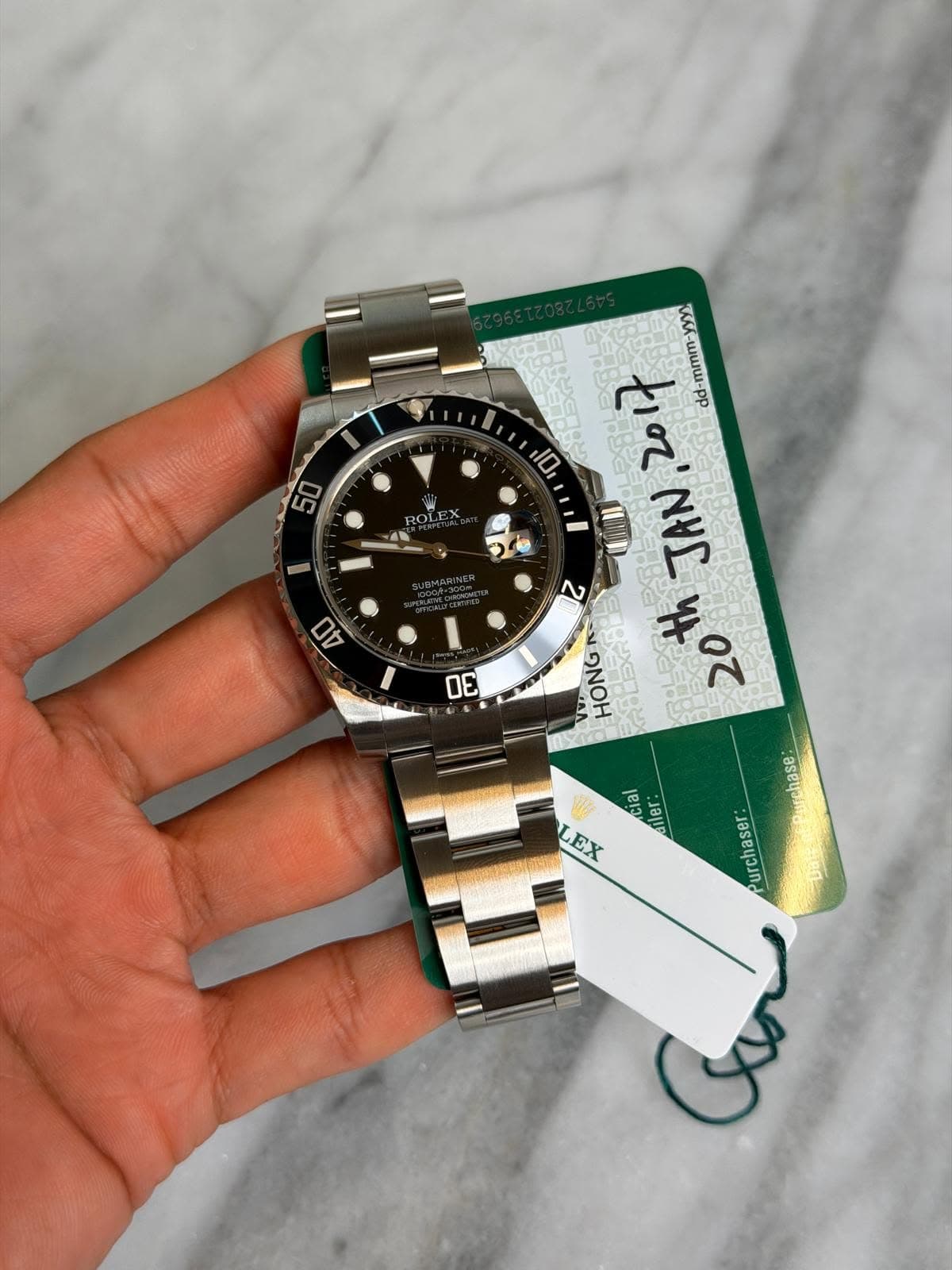 May be an image of wrist watch and text that says '50 ROLE 04 OE yyy ት dd-mmm- 10 ,2017 20hJAN,2017 20 BEEET 2 JAN 2 th 20h 20 プン OLEXROL NNOH cial Ie diler Purchase: EX Purchaser'