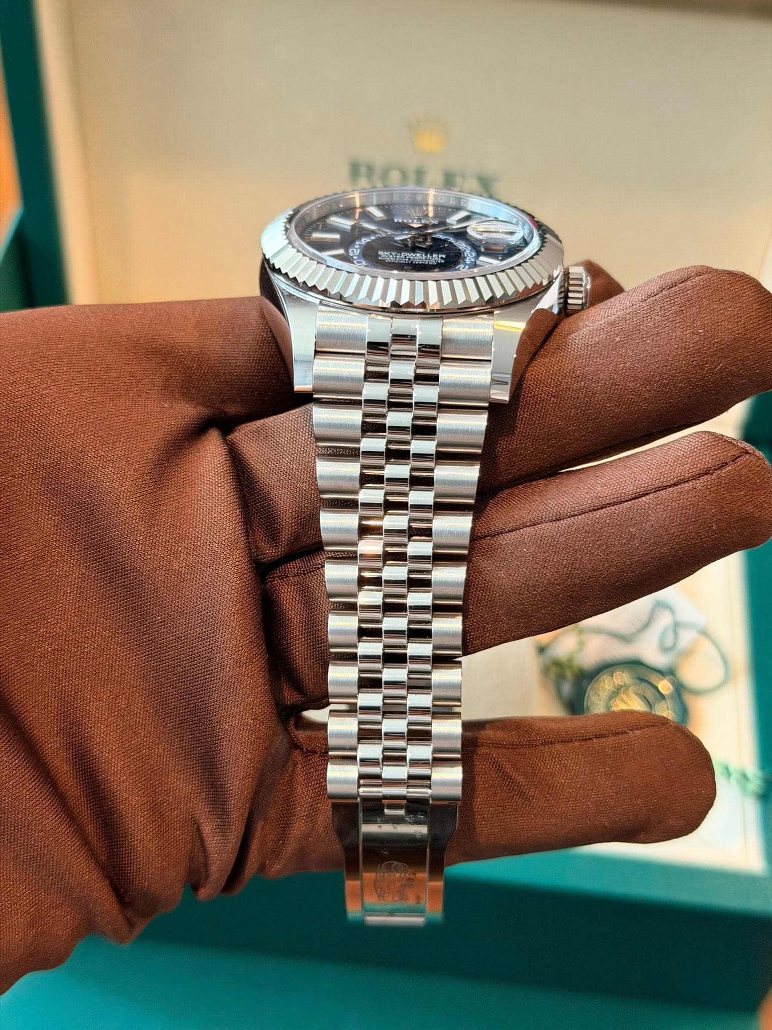 May be an image of wrist watch and text