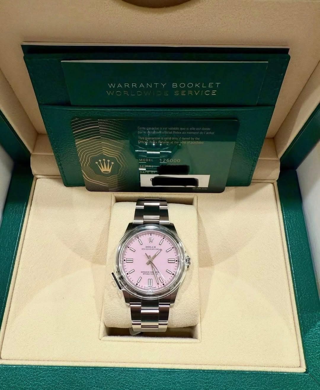 May be an image of wrist watch and text