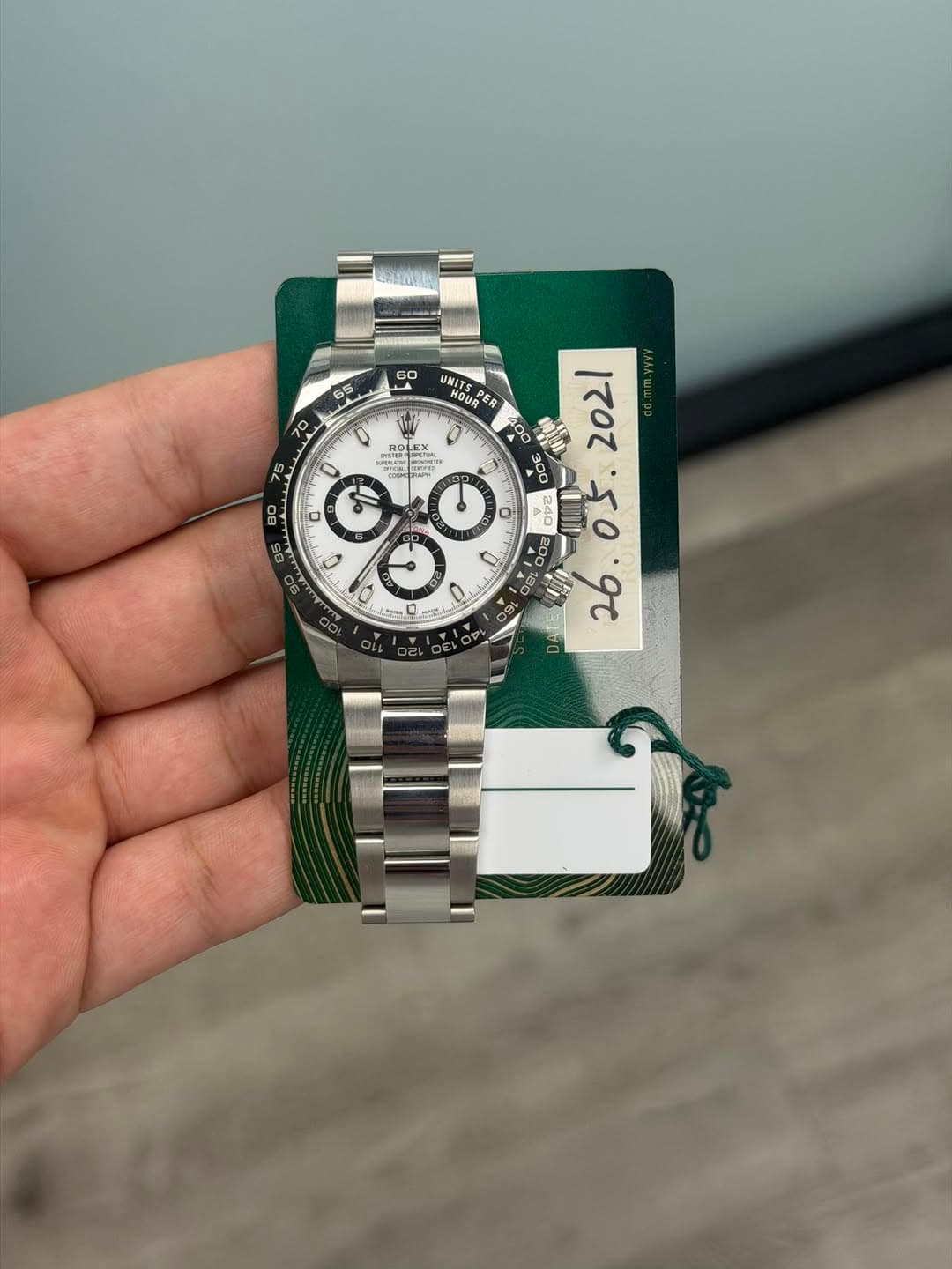 May be an image of wrist watch and text
