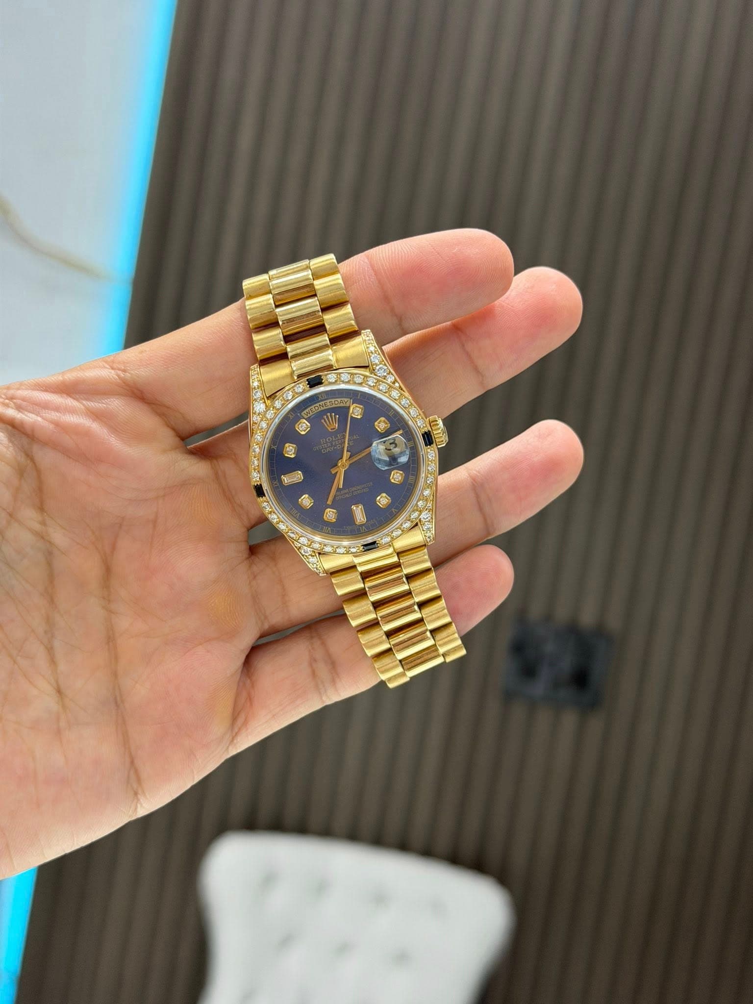 May be an image of wrist watch and text