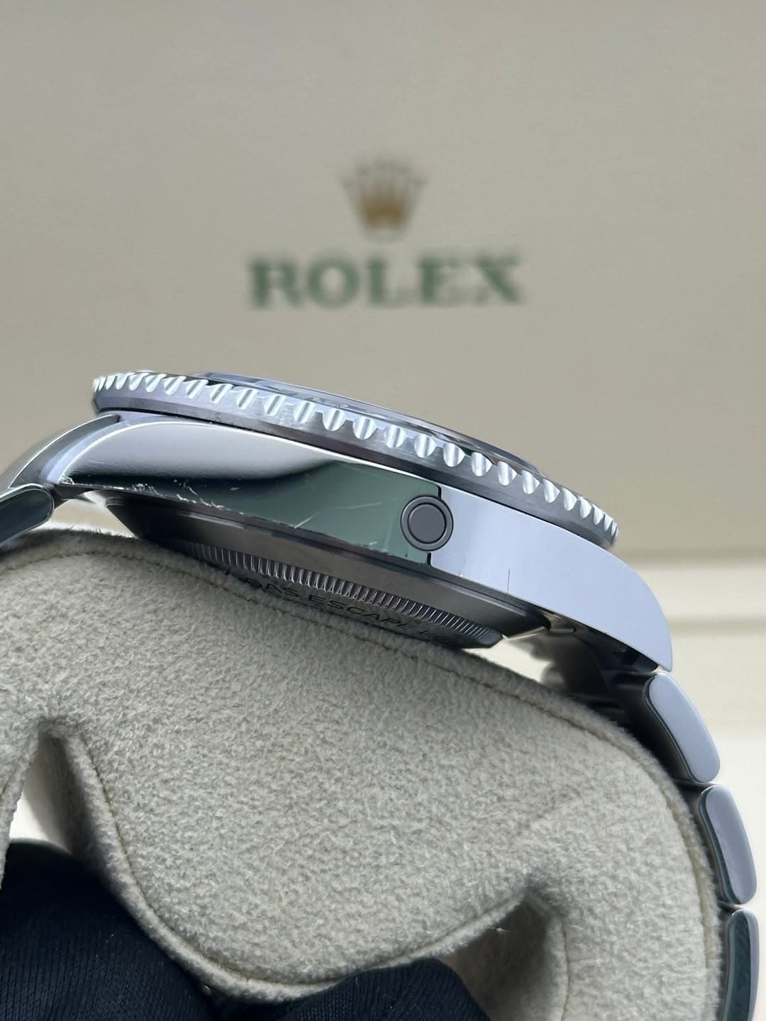 May be an image of wrist watch and text