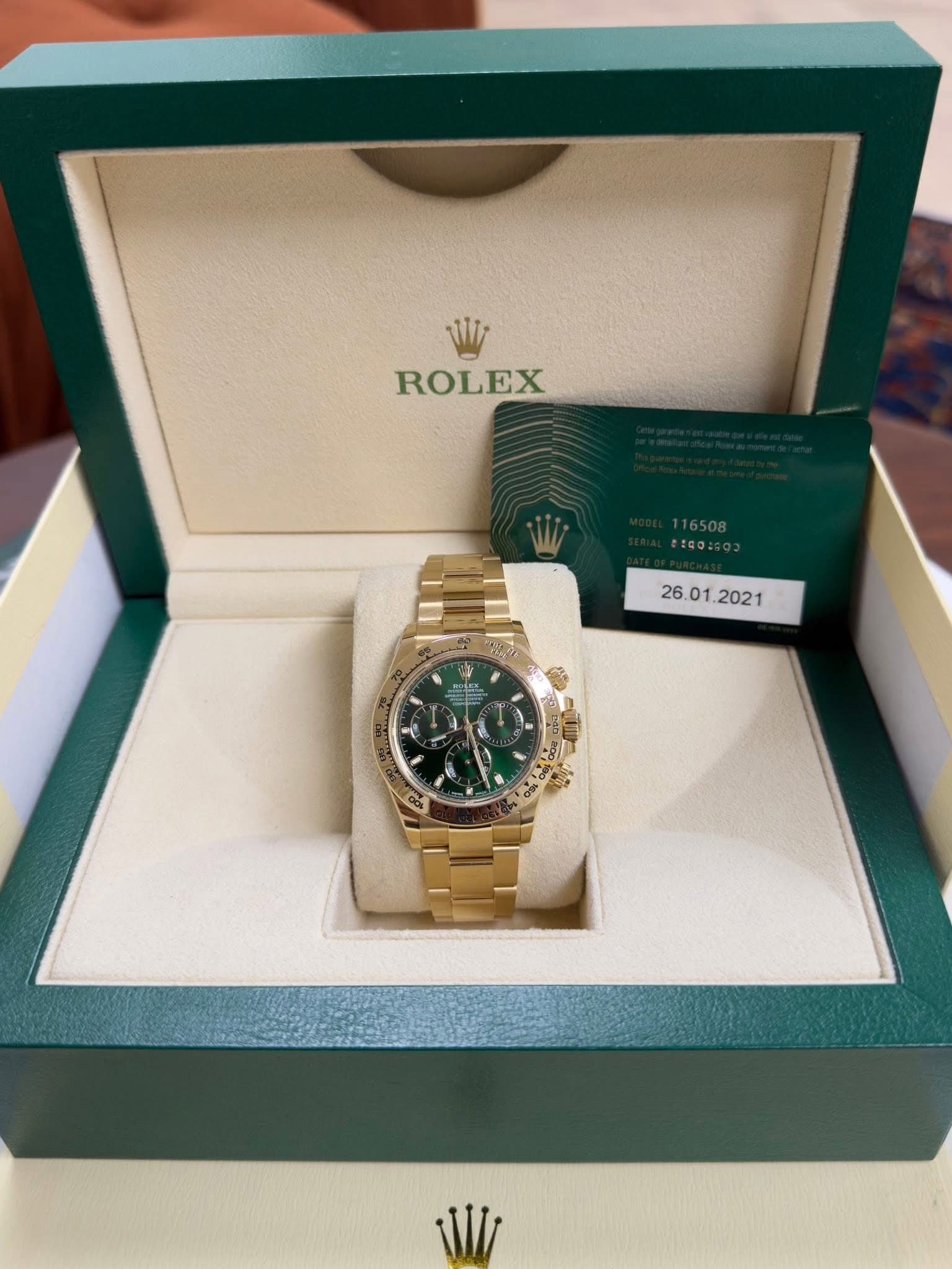 May be an image of wrist watch and text that says 'ROLEX :IGO: ー මල් 2 維 8 W'
