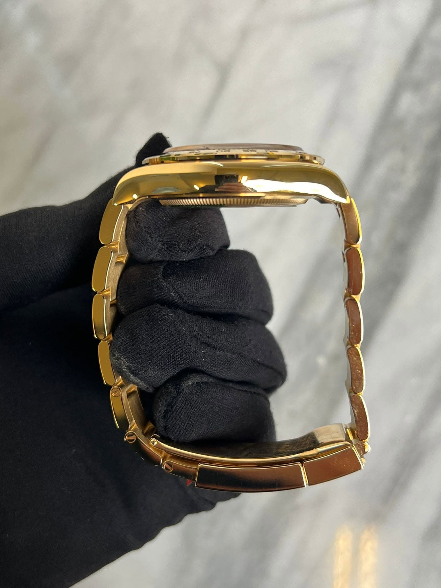 May be an image of jewelry and wrist watch