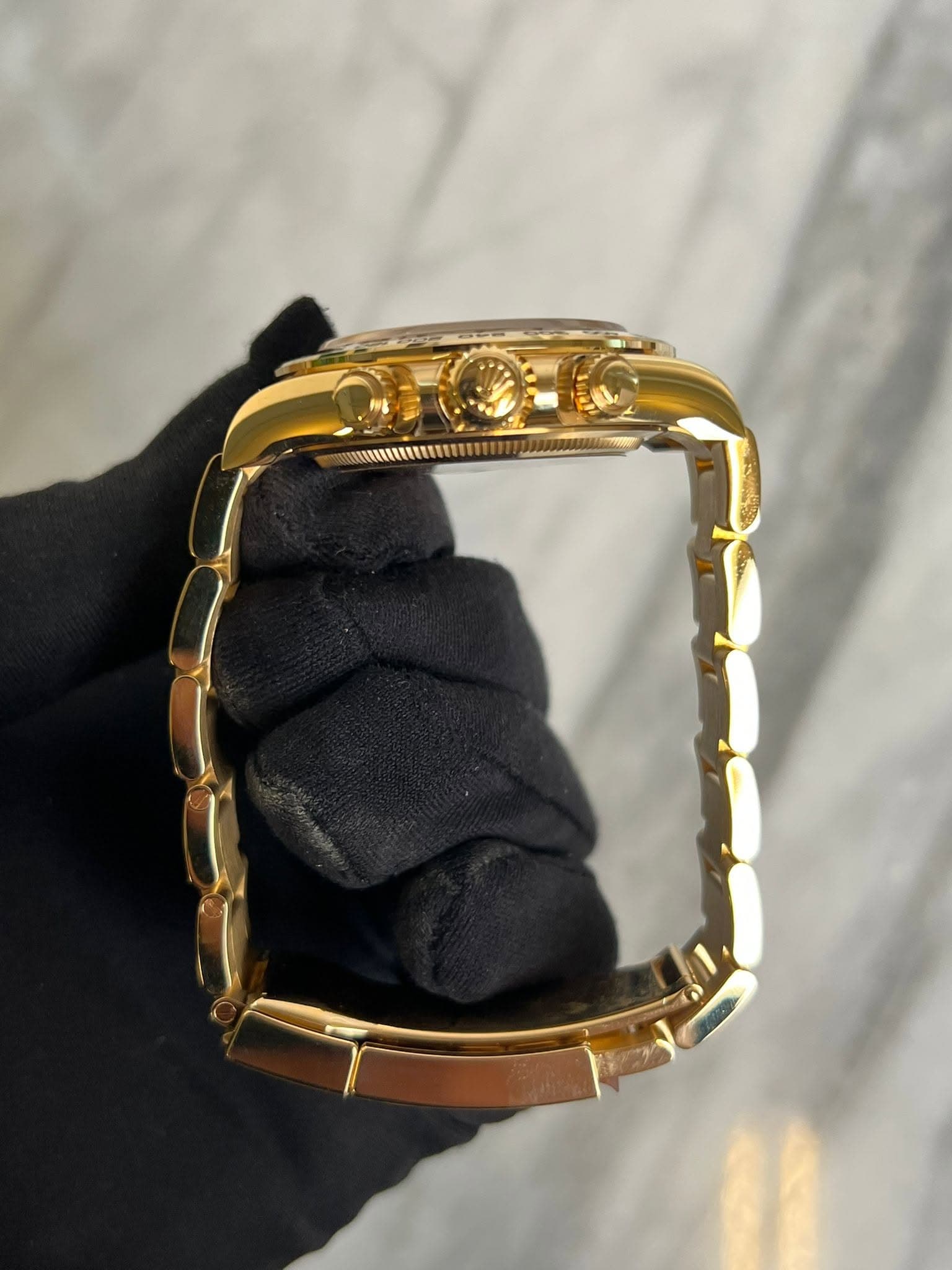 May be an image of wrist watch and jewelry