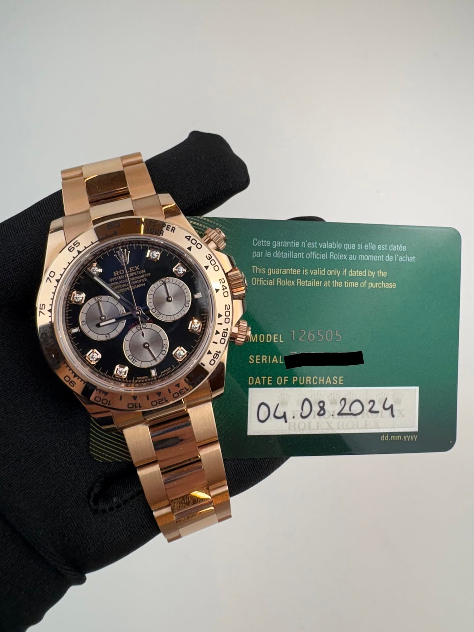 May be an image of wrist watch and text that says '65 約 ین 70 A5 10 75 Cetegramieneat Cette garantie n'est valable que elle lee est datée par parledétaillantoffi officiel Rolex…