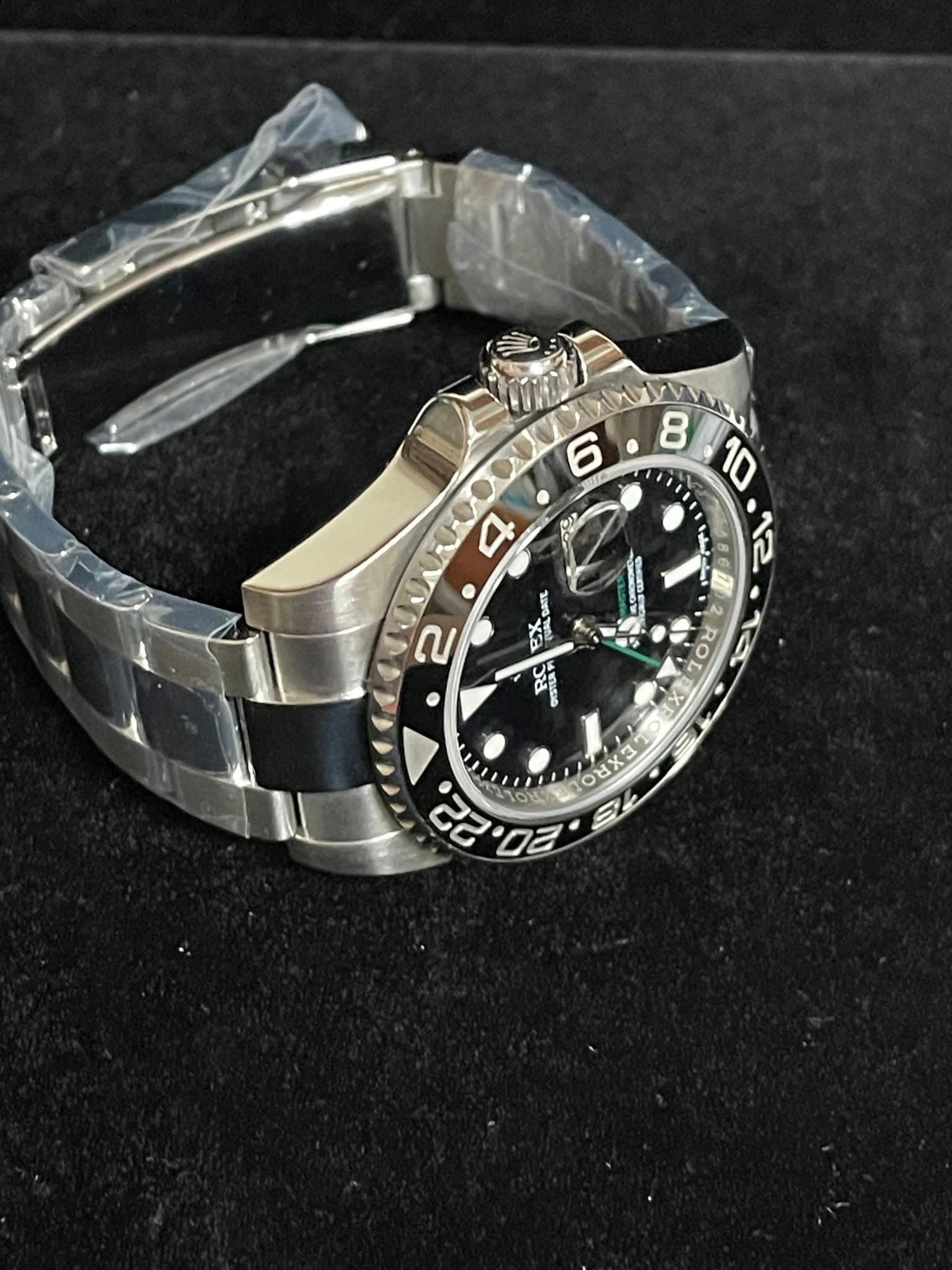 May be an image of wrist watch and text