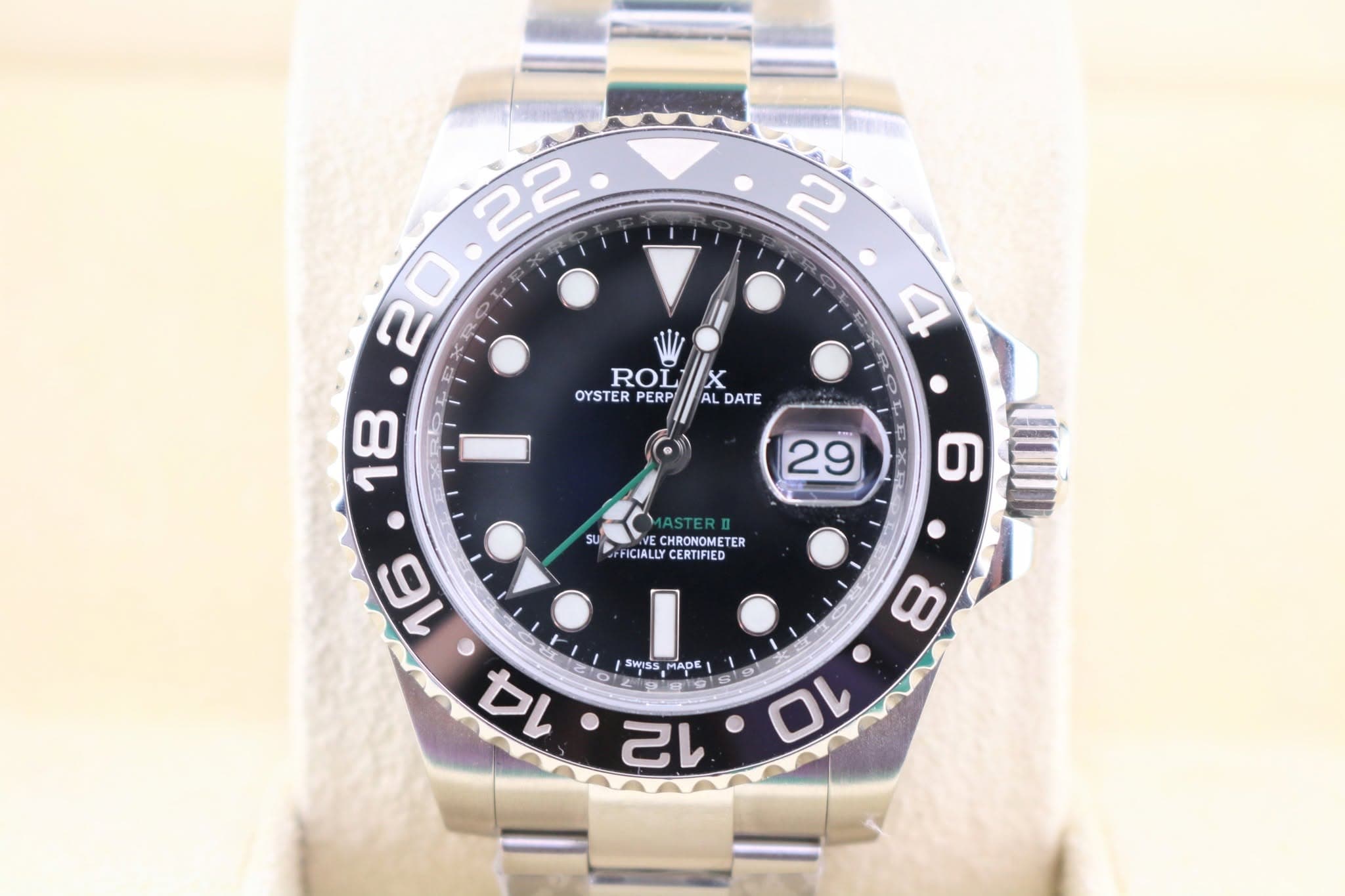 May be an image of wrist watch and text that says ' ROL OYSTER PERP X AL DATE 4 29 SU 6 CHRONOMETER TER FICIALLY CERTIFIED 16 14 SWIS MAD ADE 9 12 8'