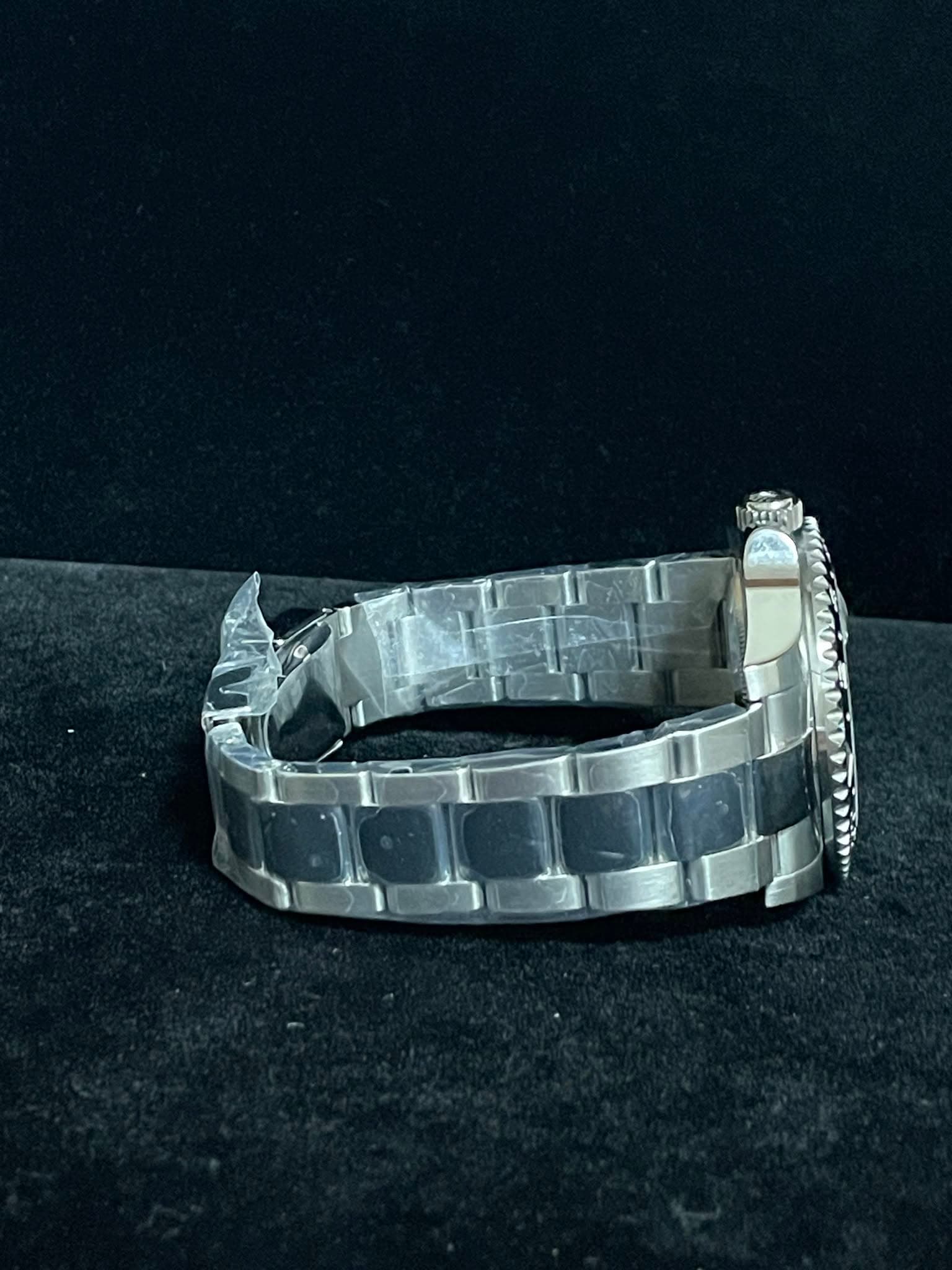 May be an image of wrist watch and jewelry