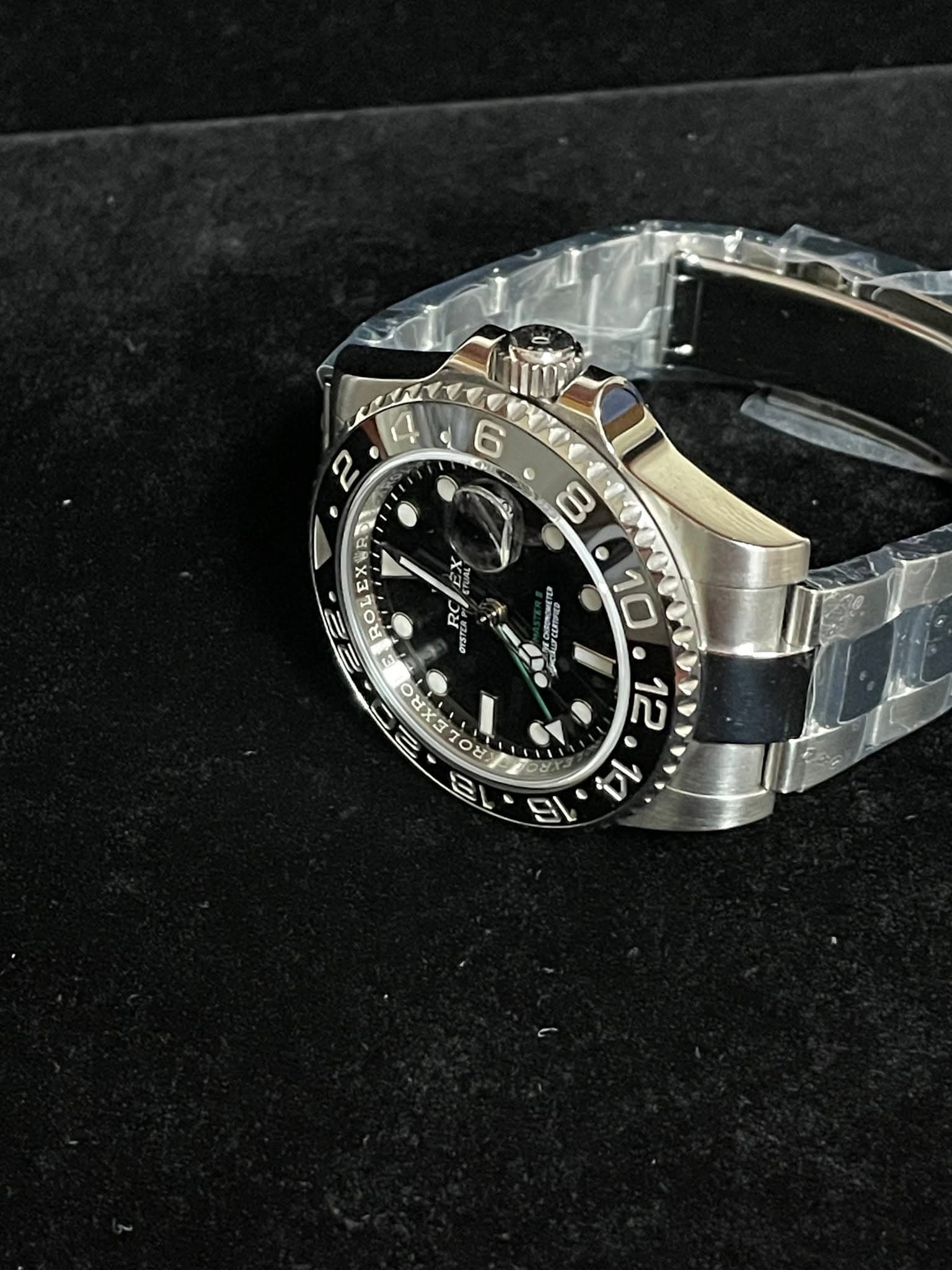 May be an image of wrist watch and text