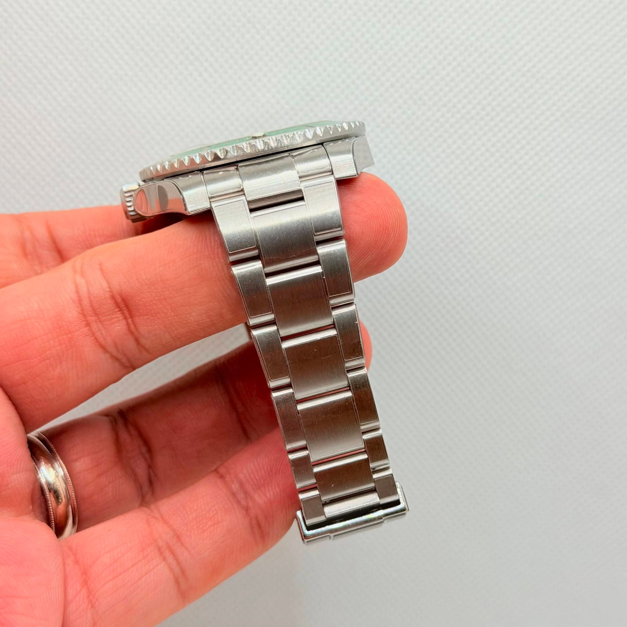 May be an image of wrist watch