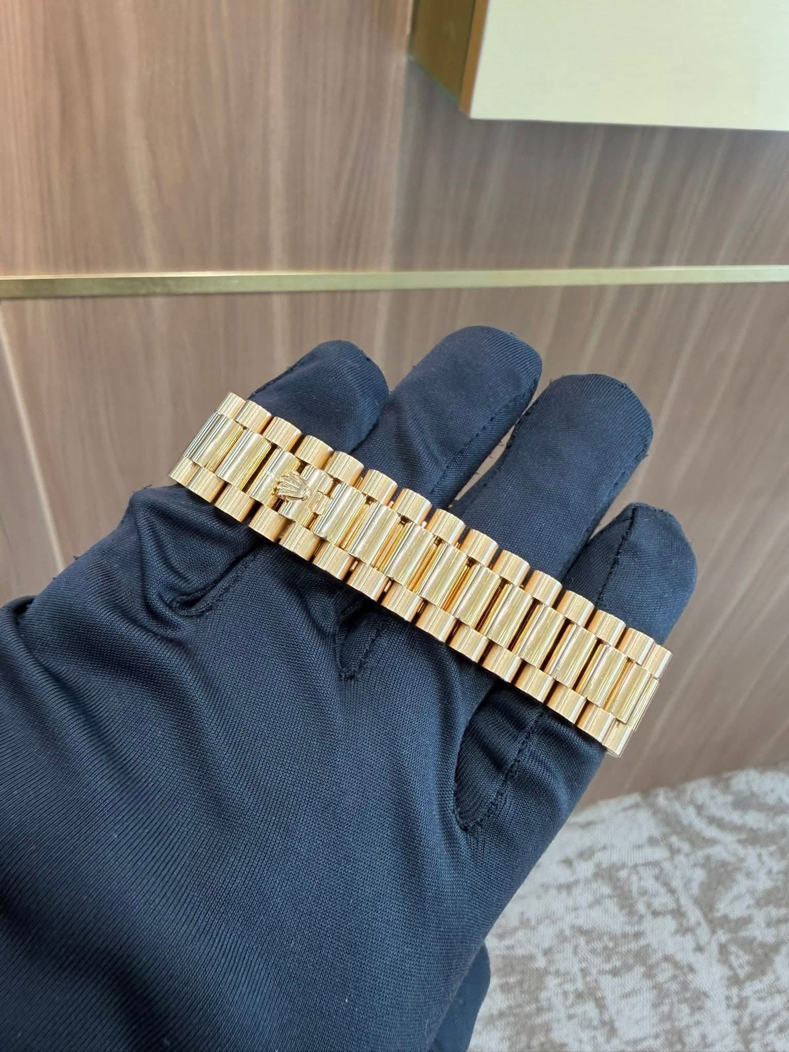 May be an image of jewelry and wrist watch