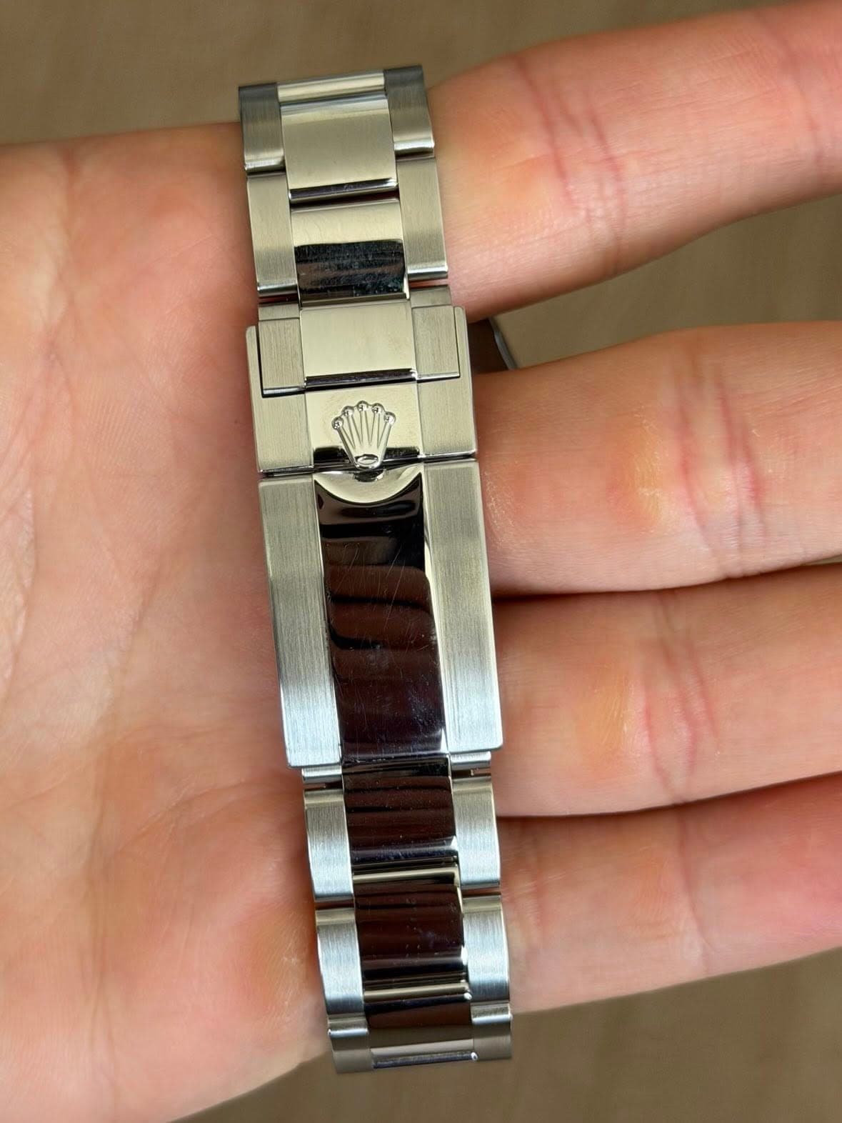 May be an image of wrist watch