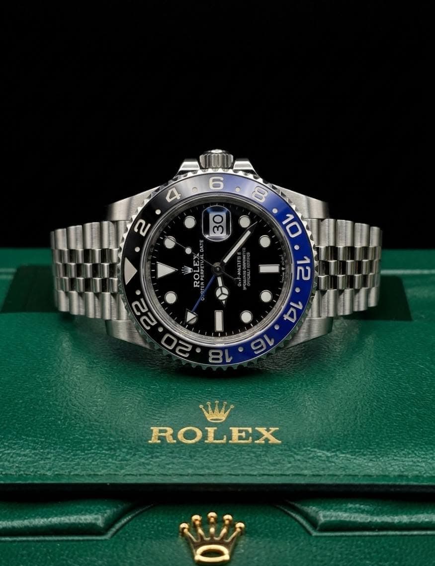 May be an image of wrist watch and text that says '6 4 2 က TTT RO 8 10 ग।।।। ROLEX c'
