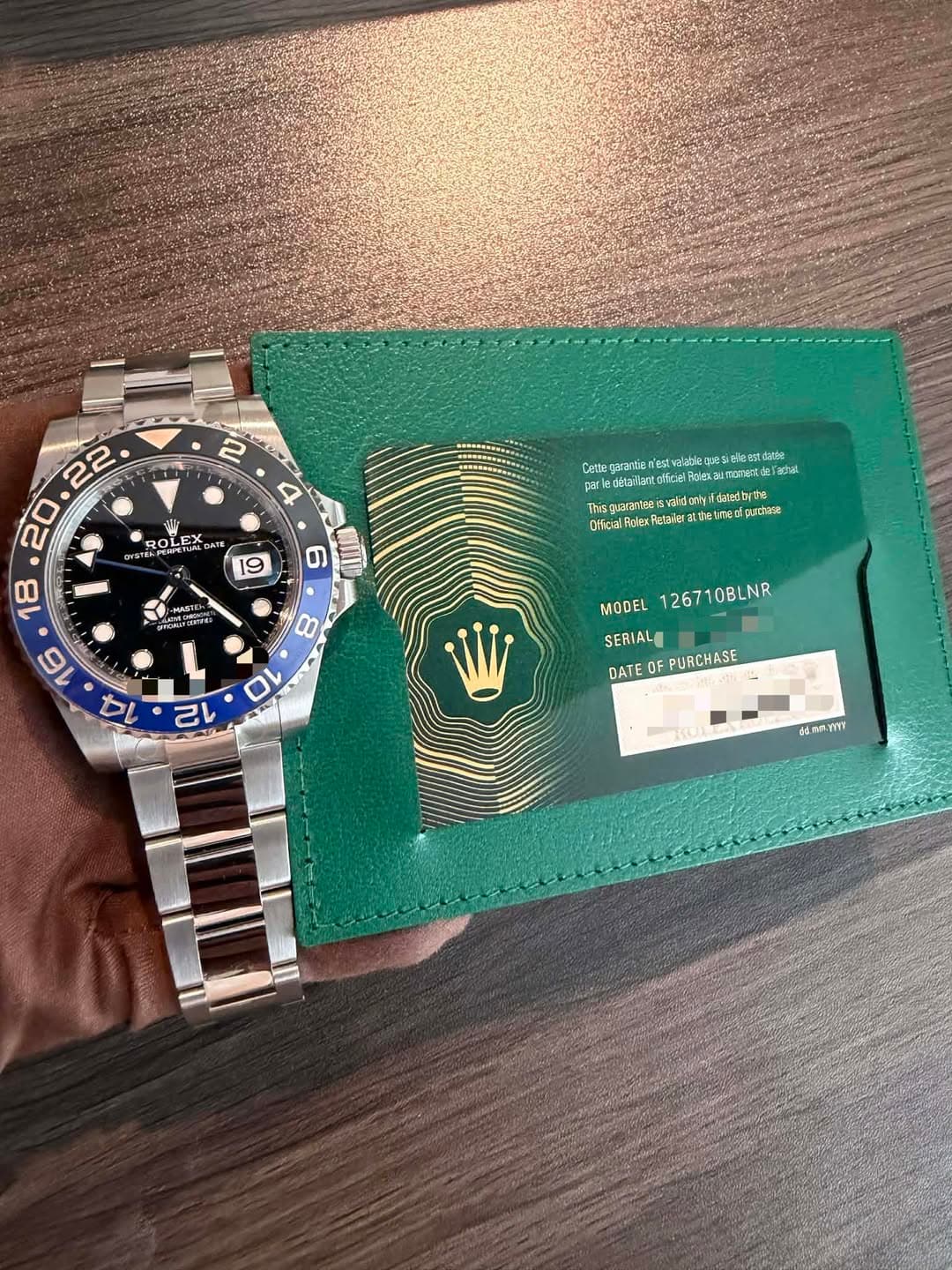 May be an image of wrist watch and text