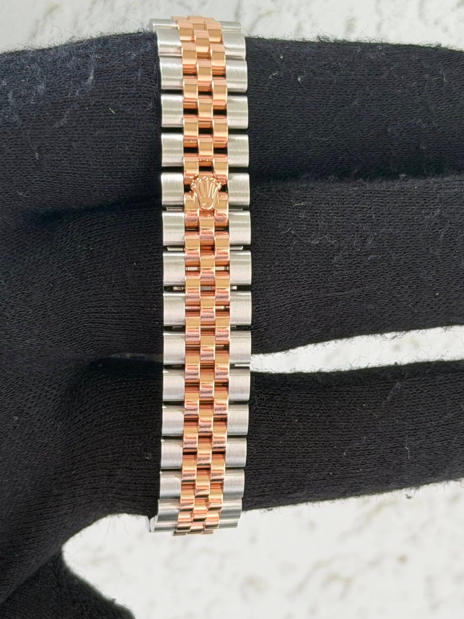 May be an image of wrist watch
