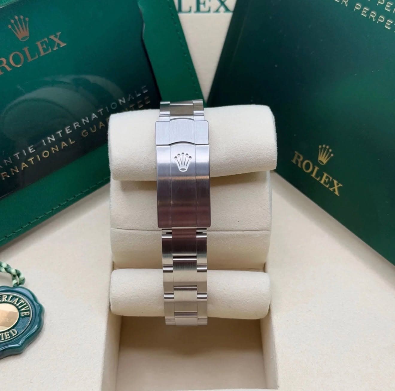 May be an image of wrist watch and text