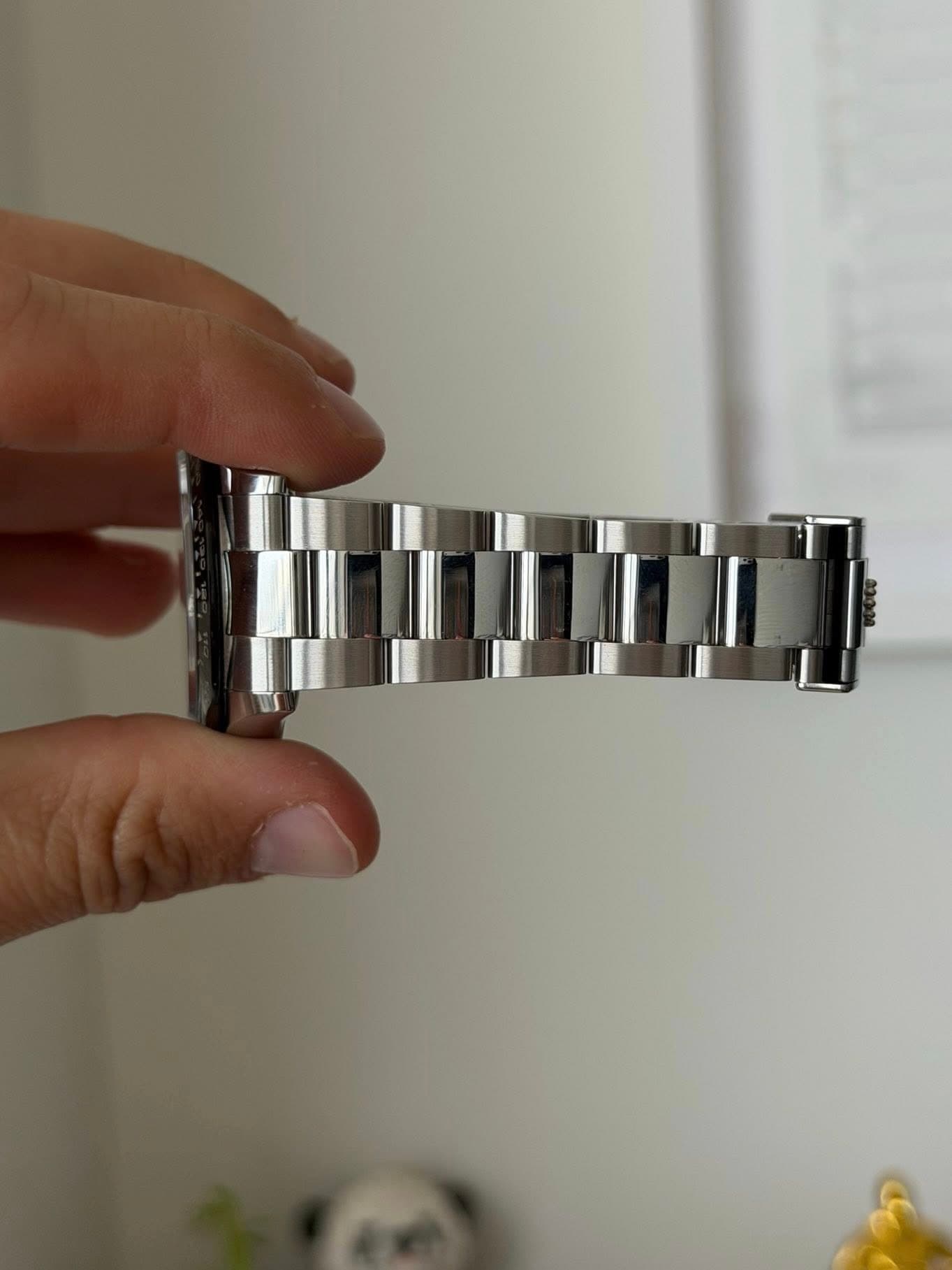 May be an image of wrist watch