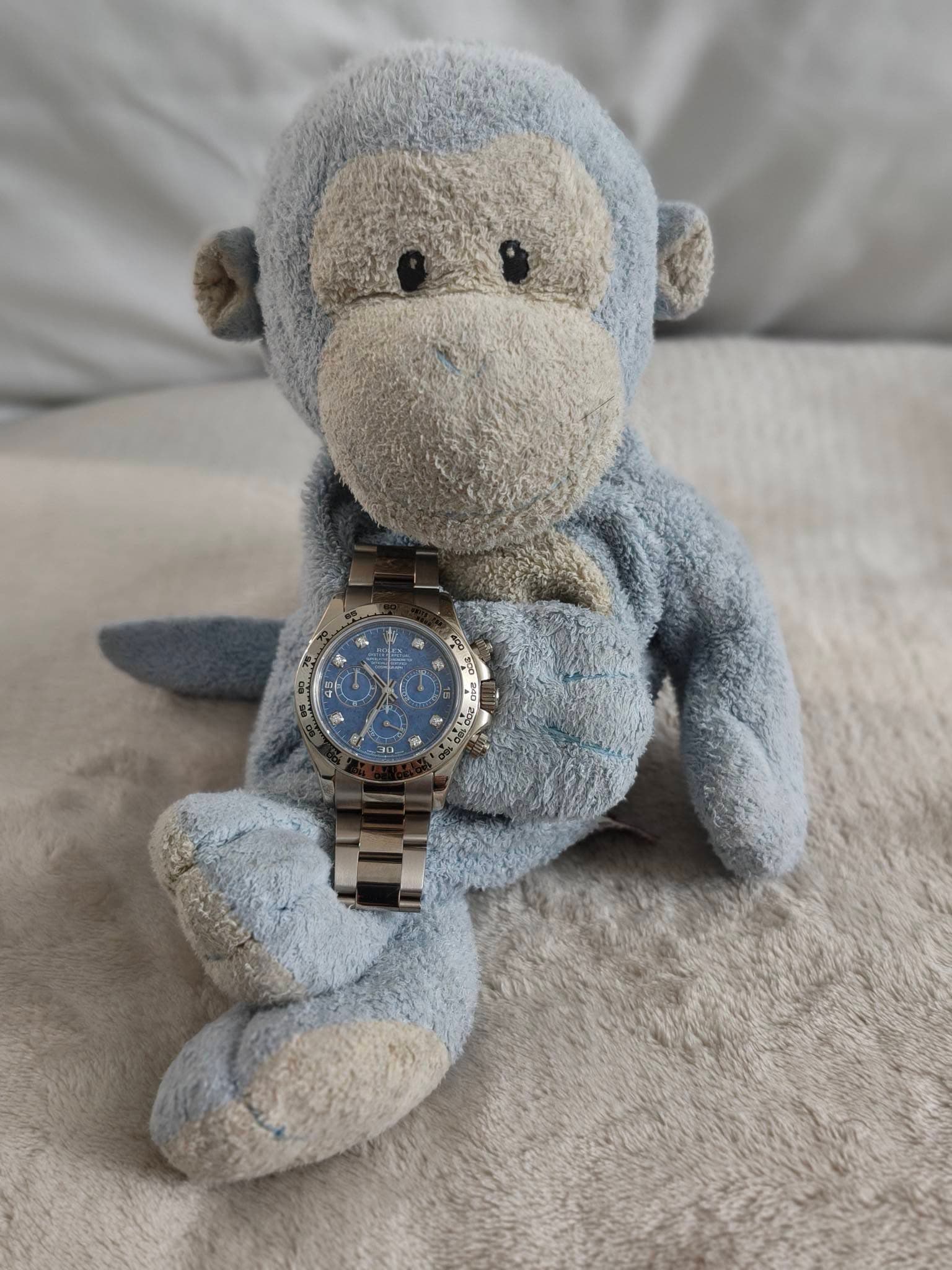 May be an image of wrist watch and text