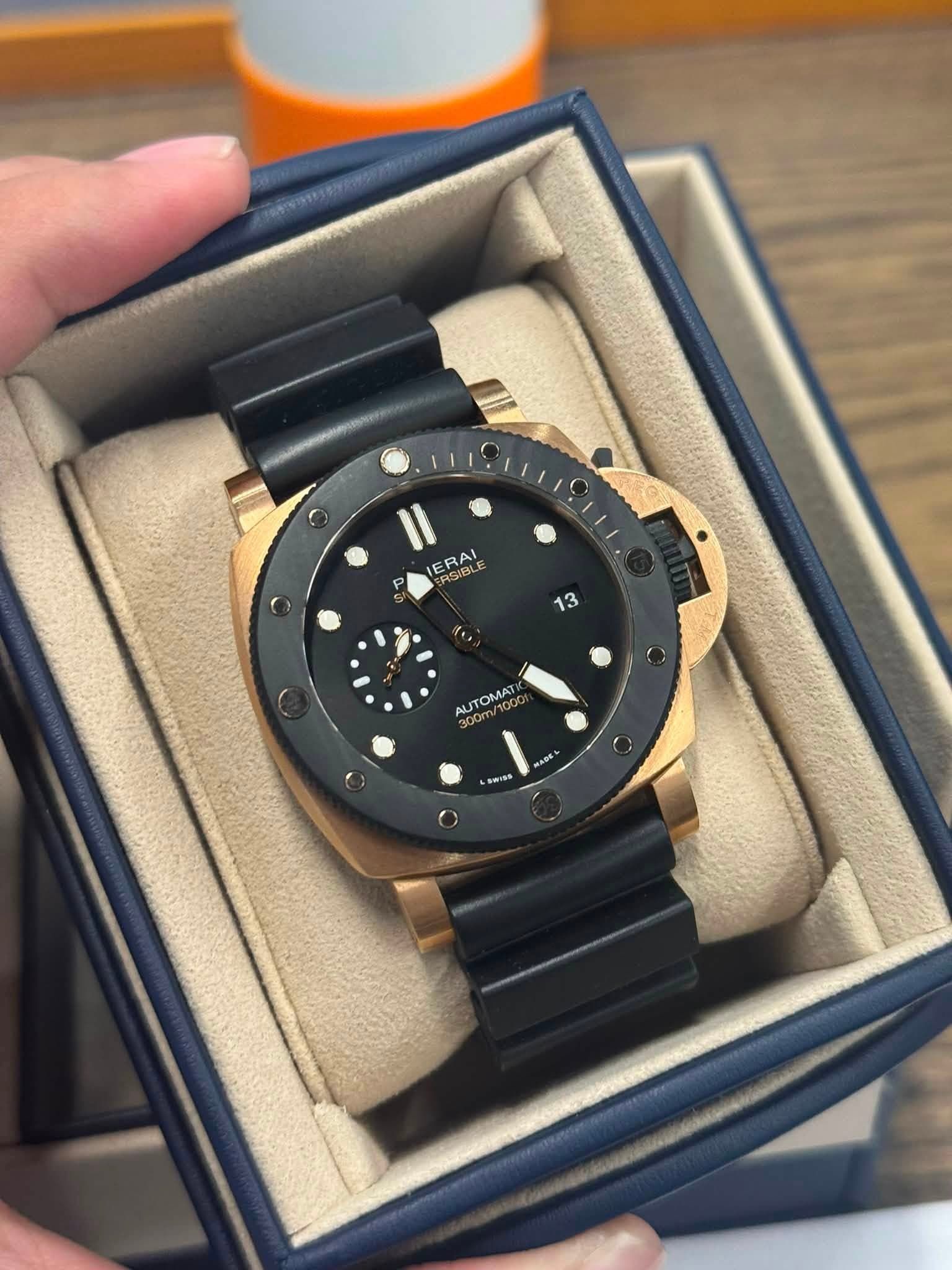 May be an image of wrist watch and text that says 'ERAI RGIBLE 13 1 ITOMAT awTaS そ番ル'