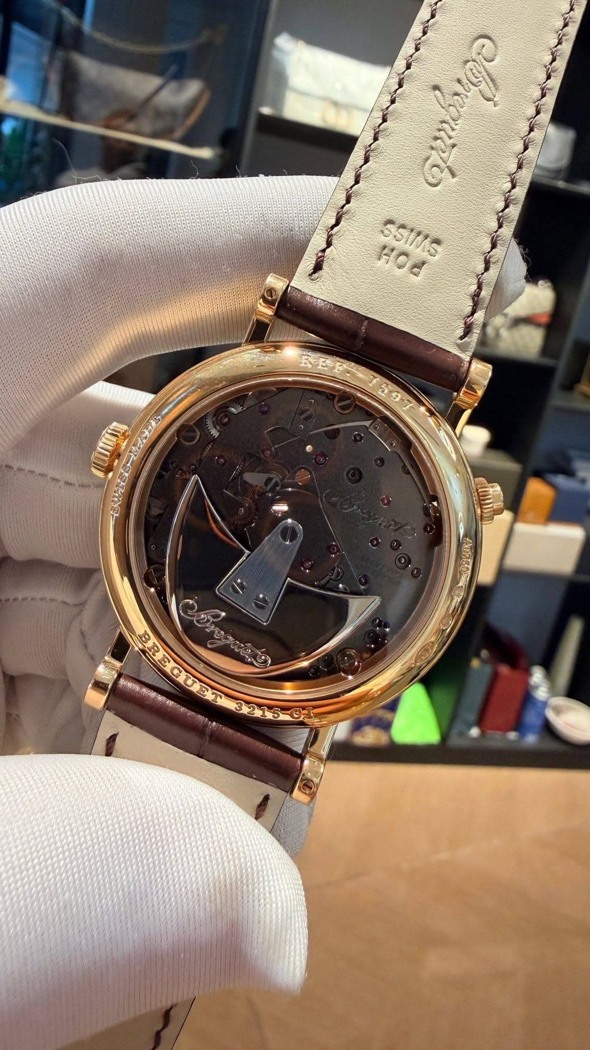 May be an image of wrist watch and text