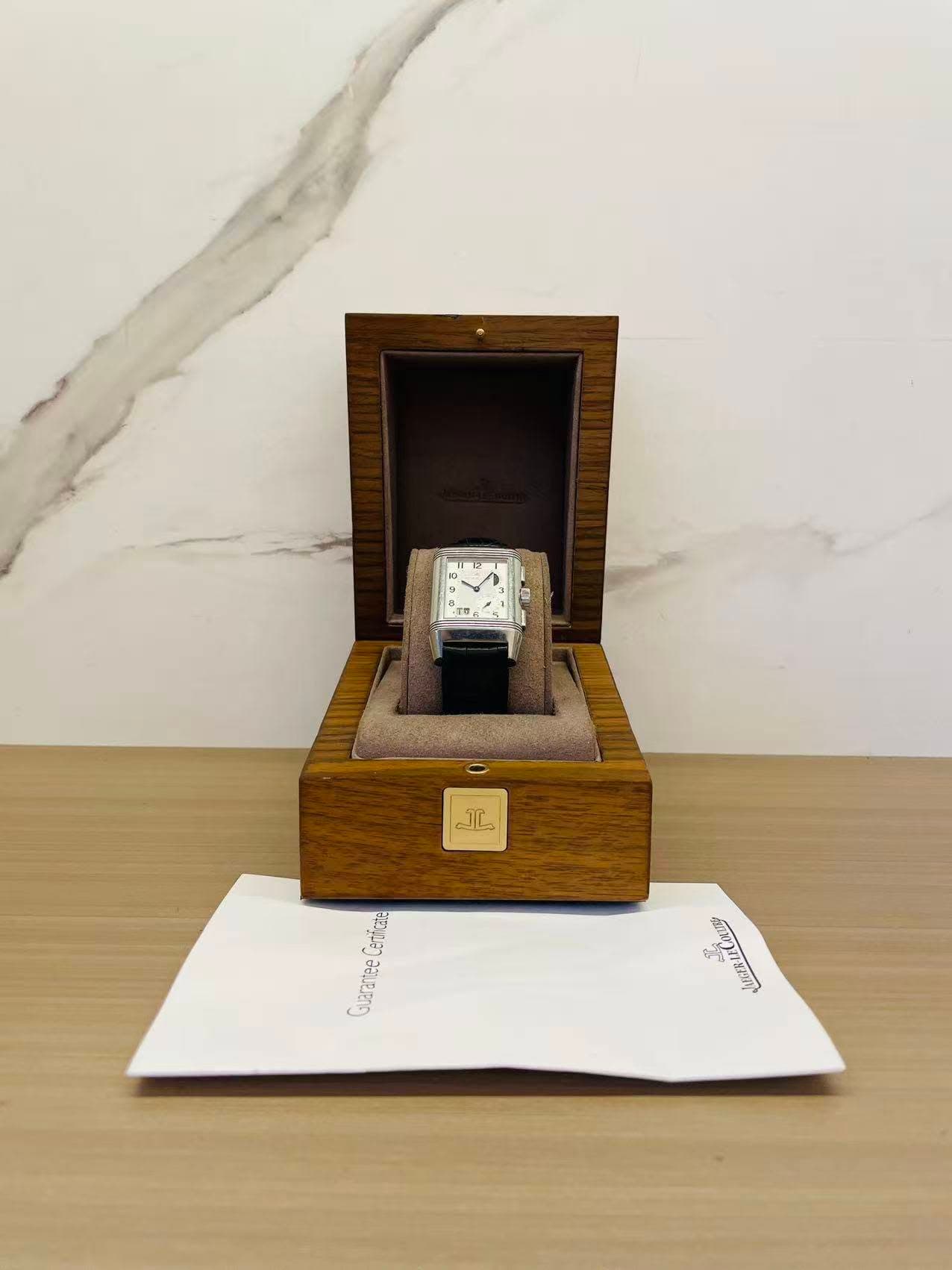 May be an image of cufflinks, ring, wrist watch and text