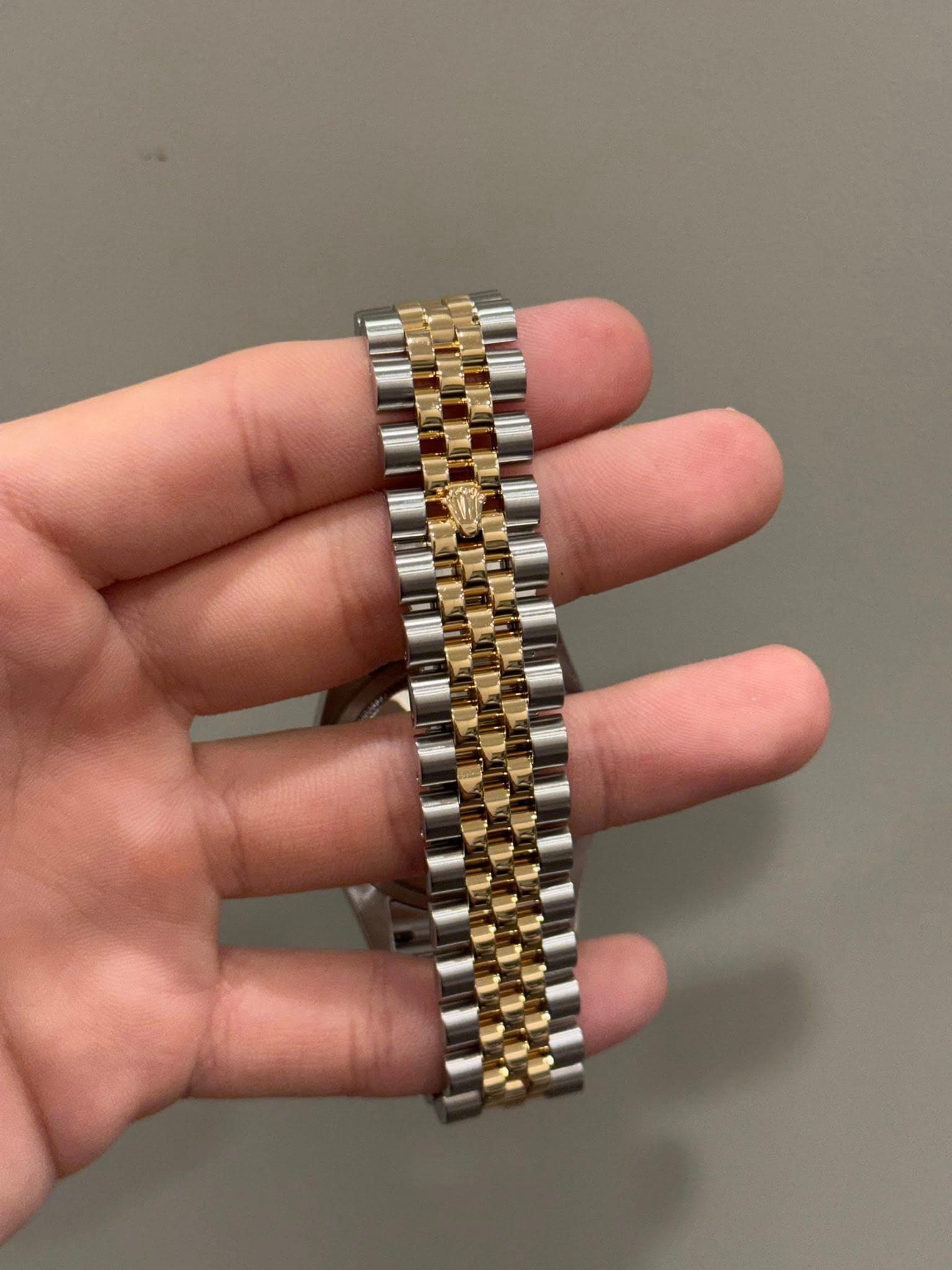May be an image of wrist watch