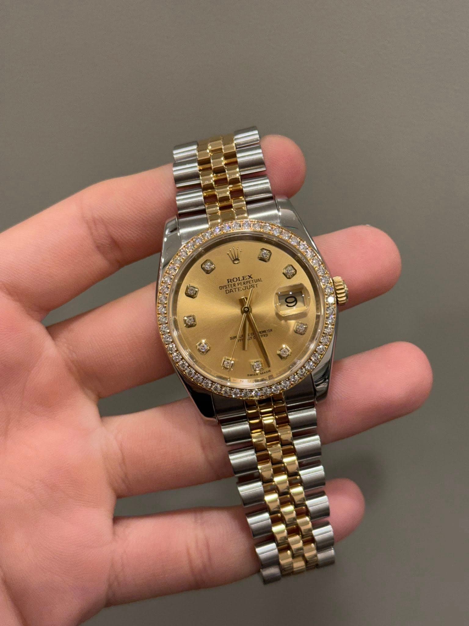 May be an image of wrist watch