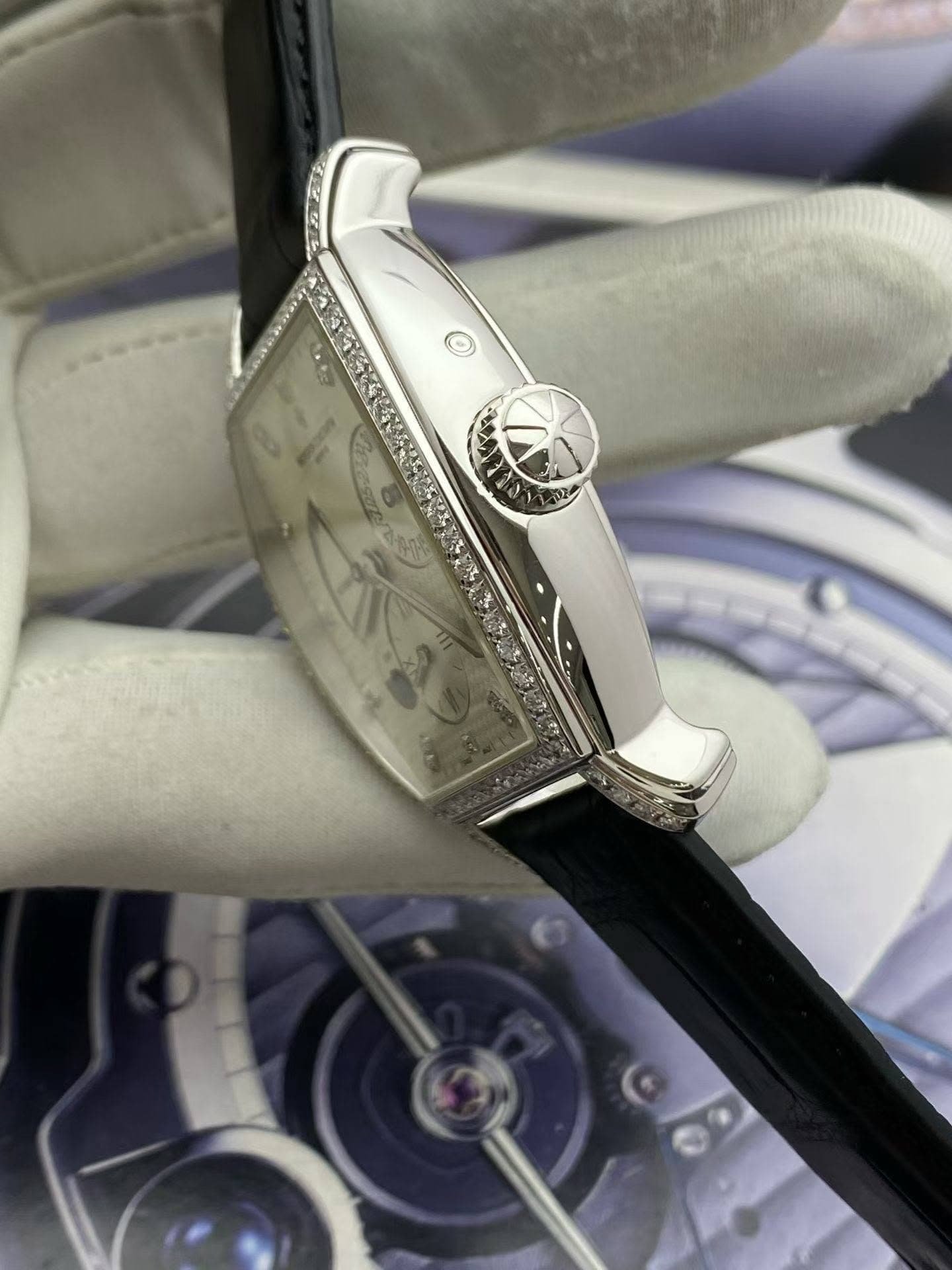 May be an image of wrist watch and text