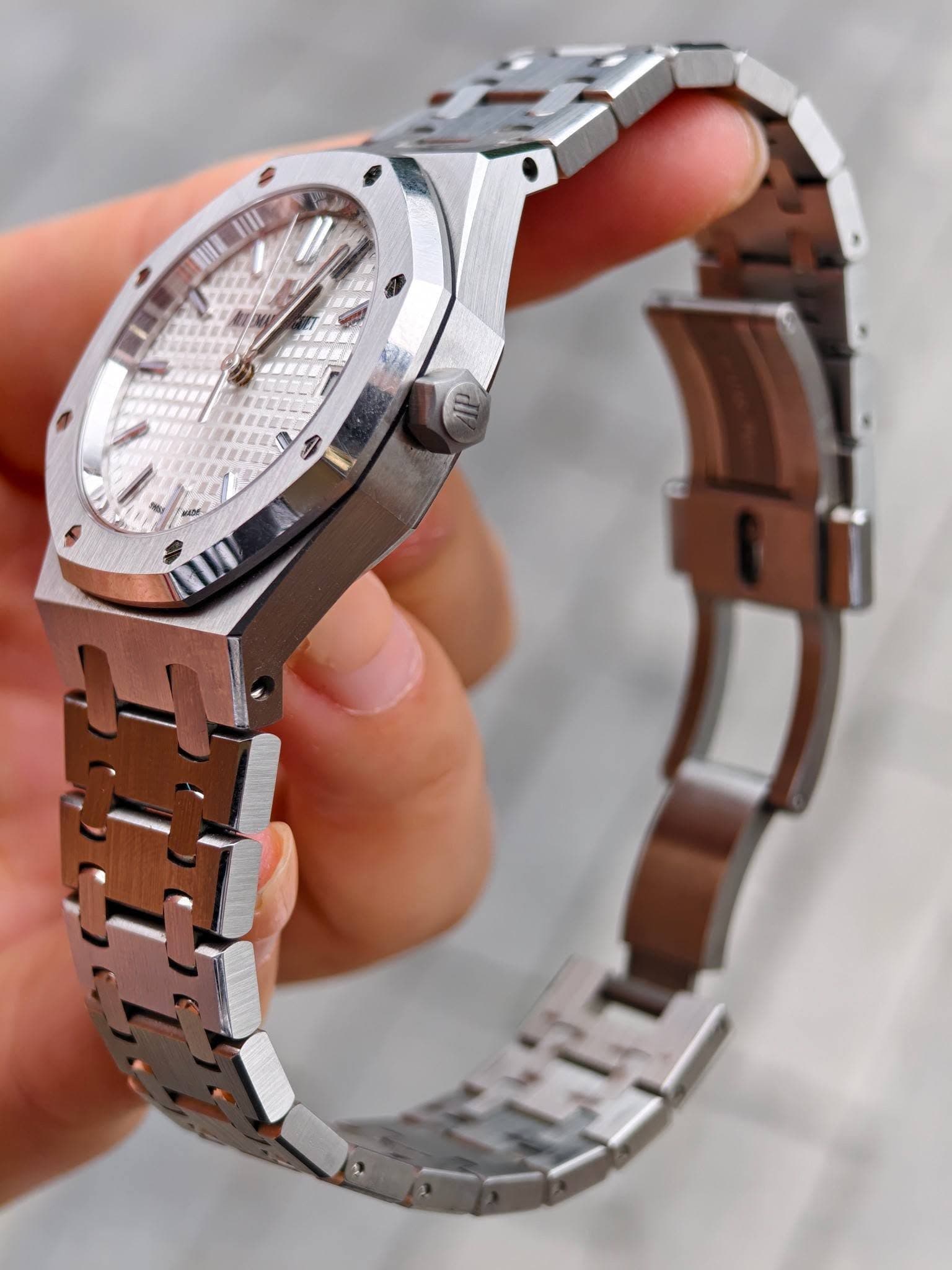 May be an image of wrist watch