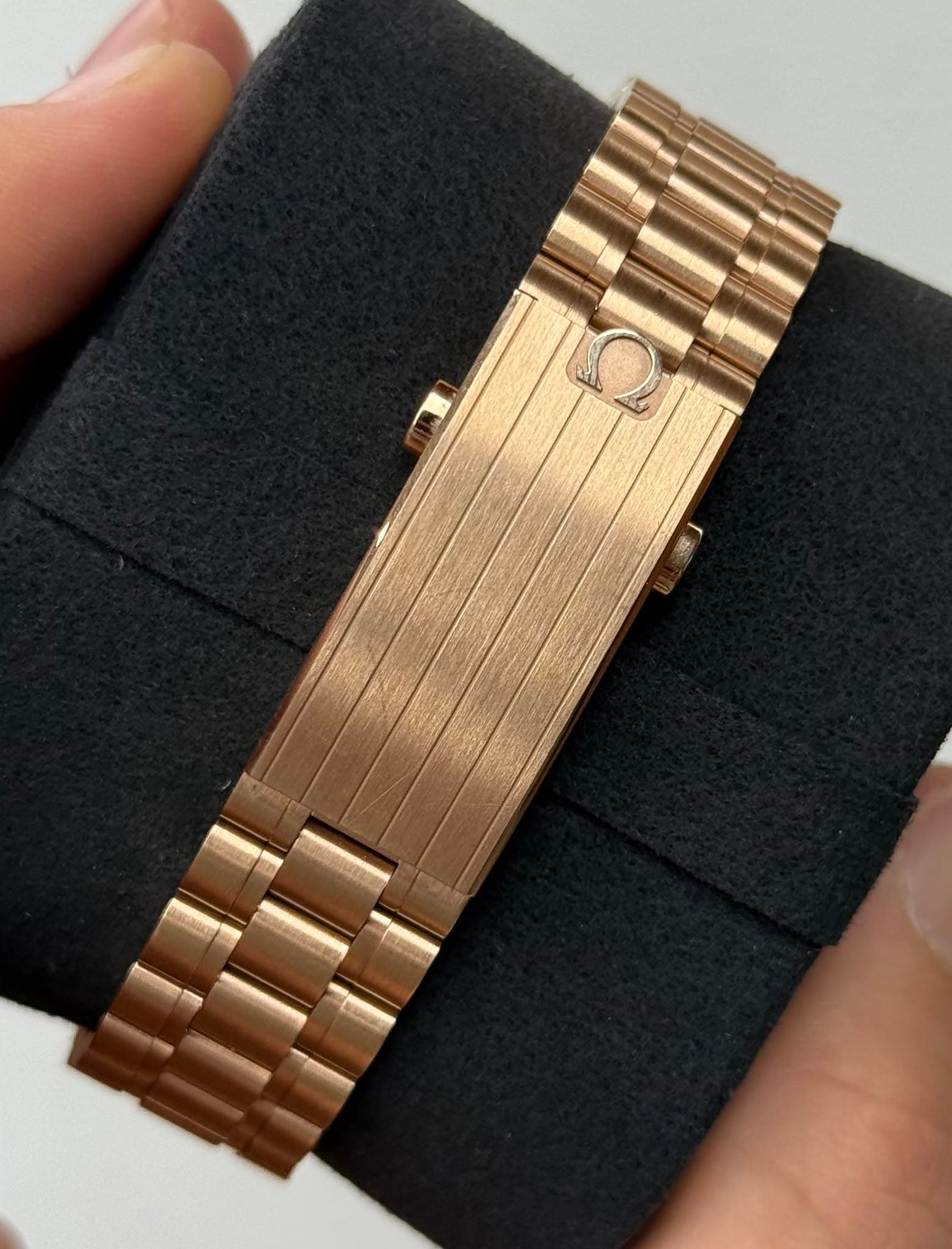 May be an image of wrist watch, jewelry and text