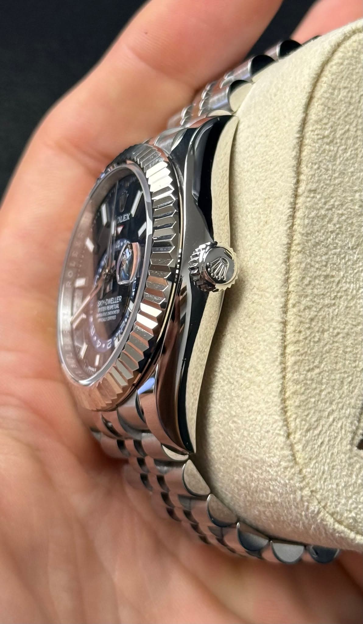 May be an image of wrist watch and text