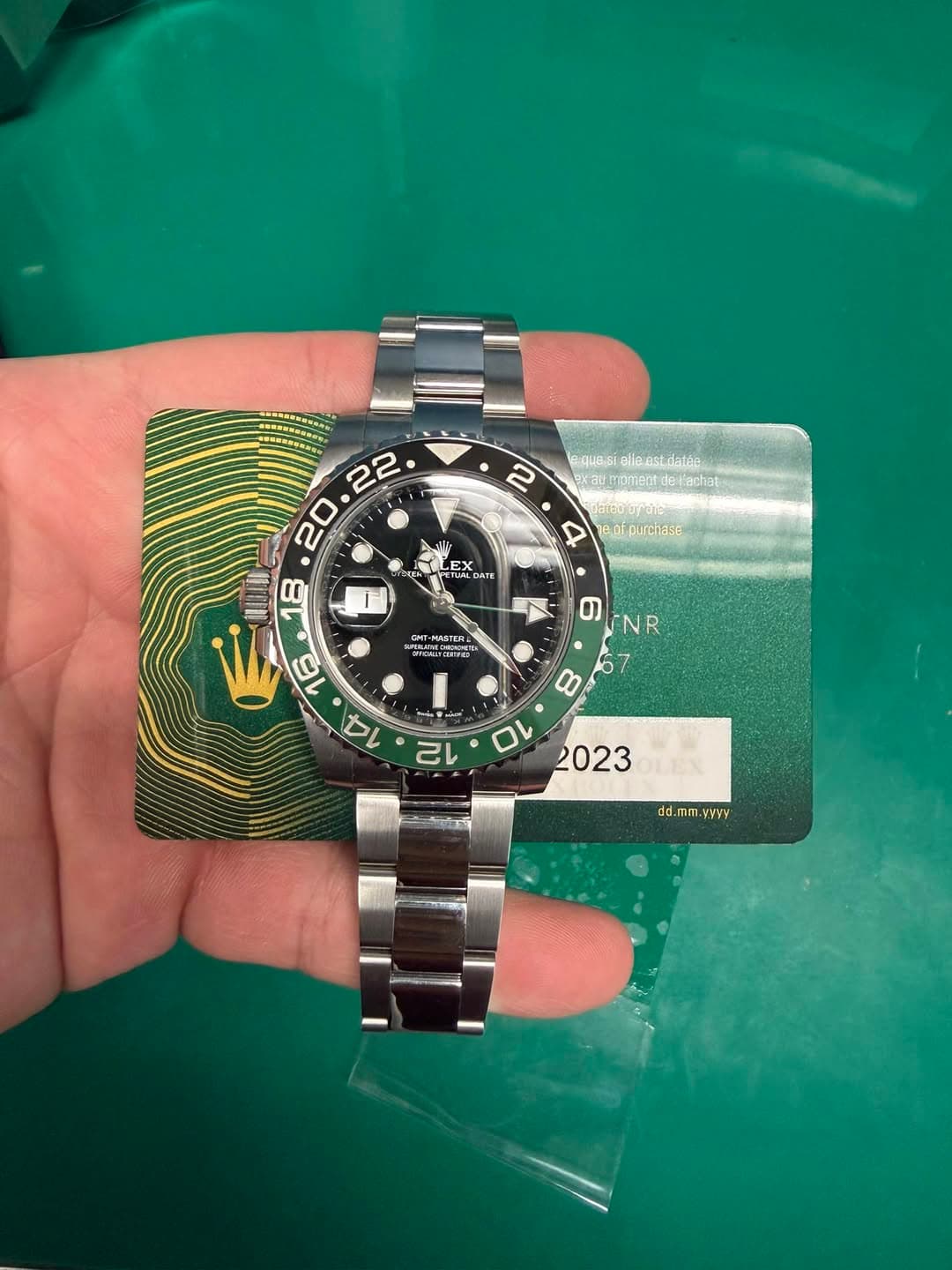 May be an image of wrist watch and text