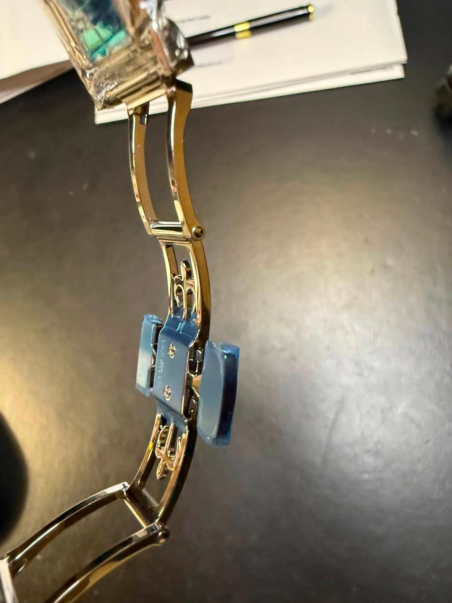 May be an image of wrist watch