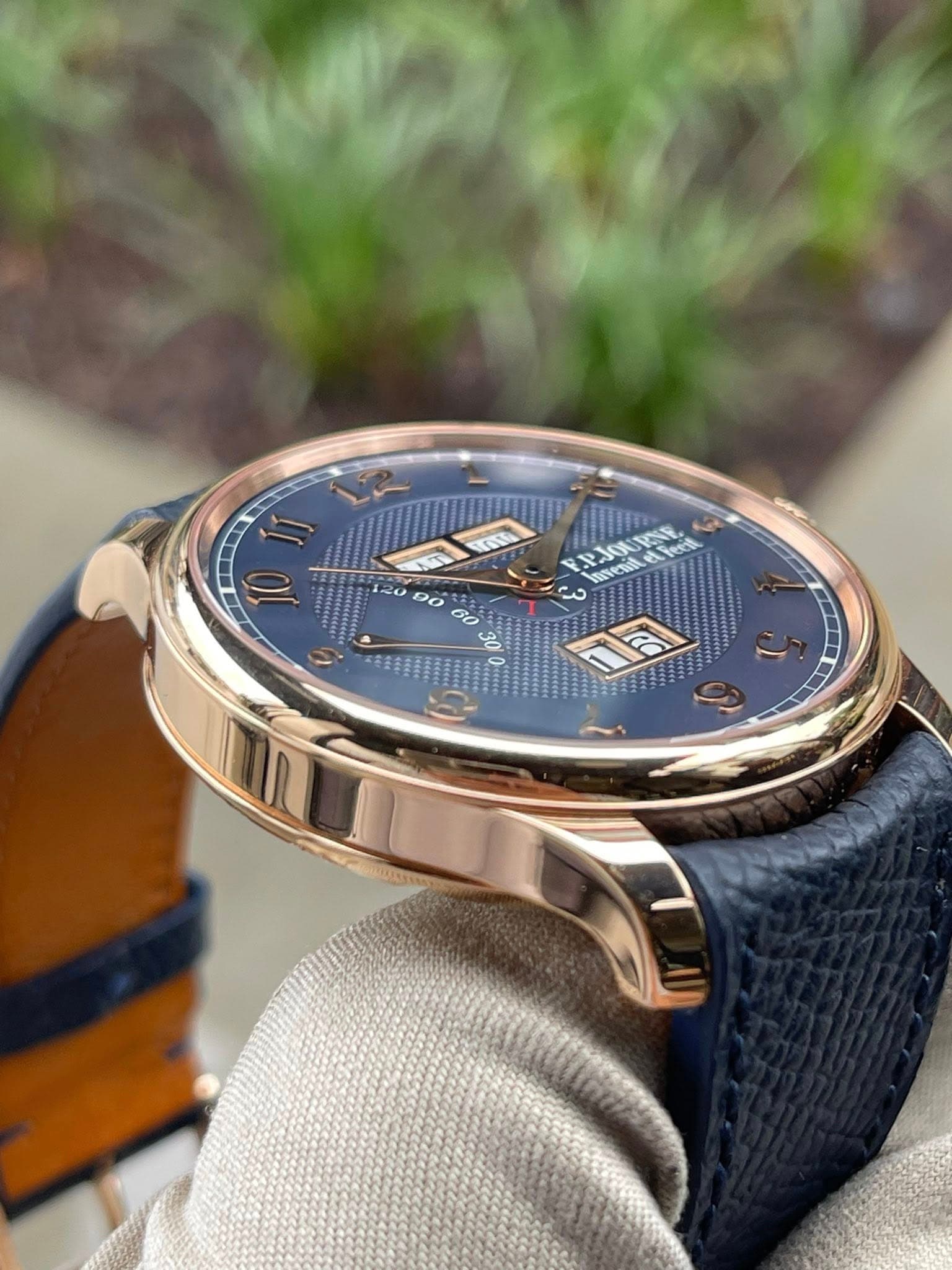 May be an image of wrist watch and text