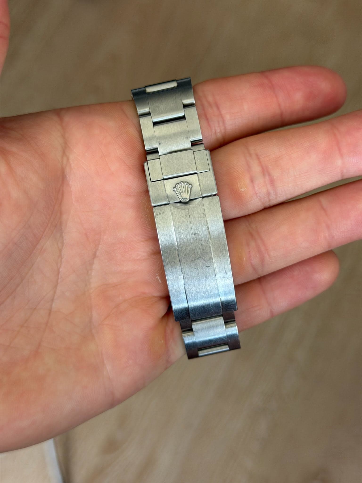 May be an image of wrist watch