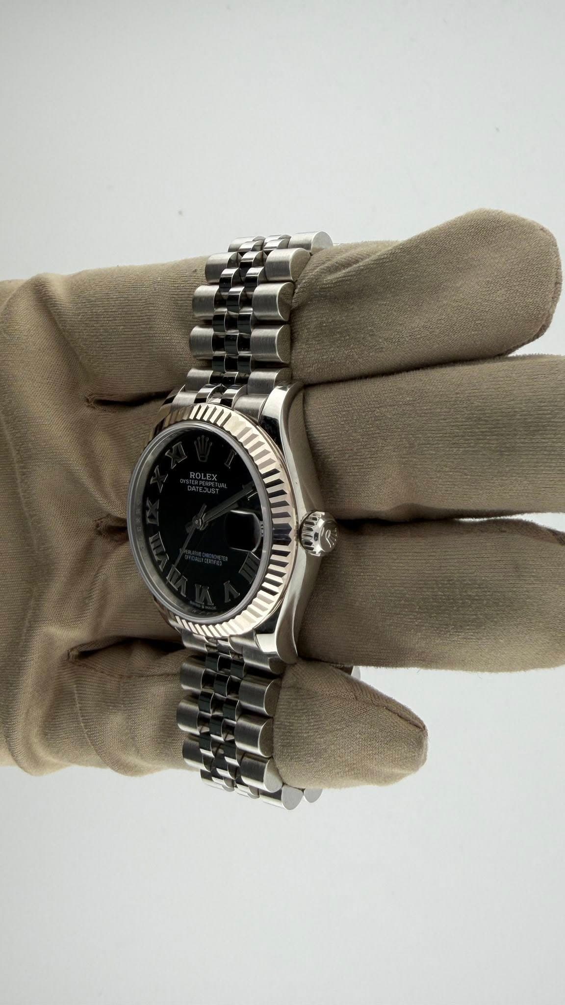 May be an image of wrist watch