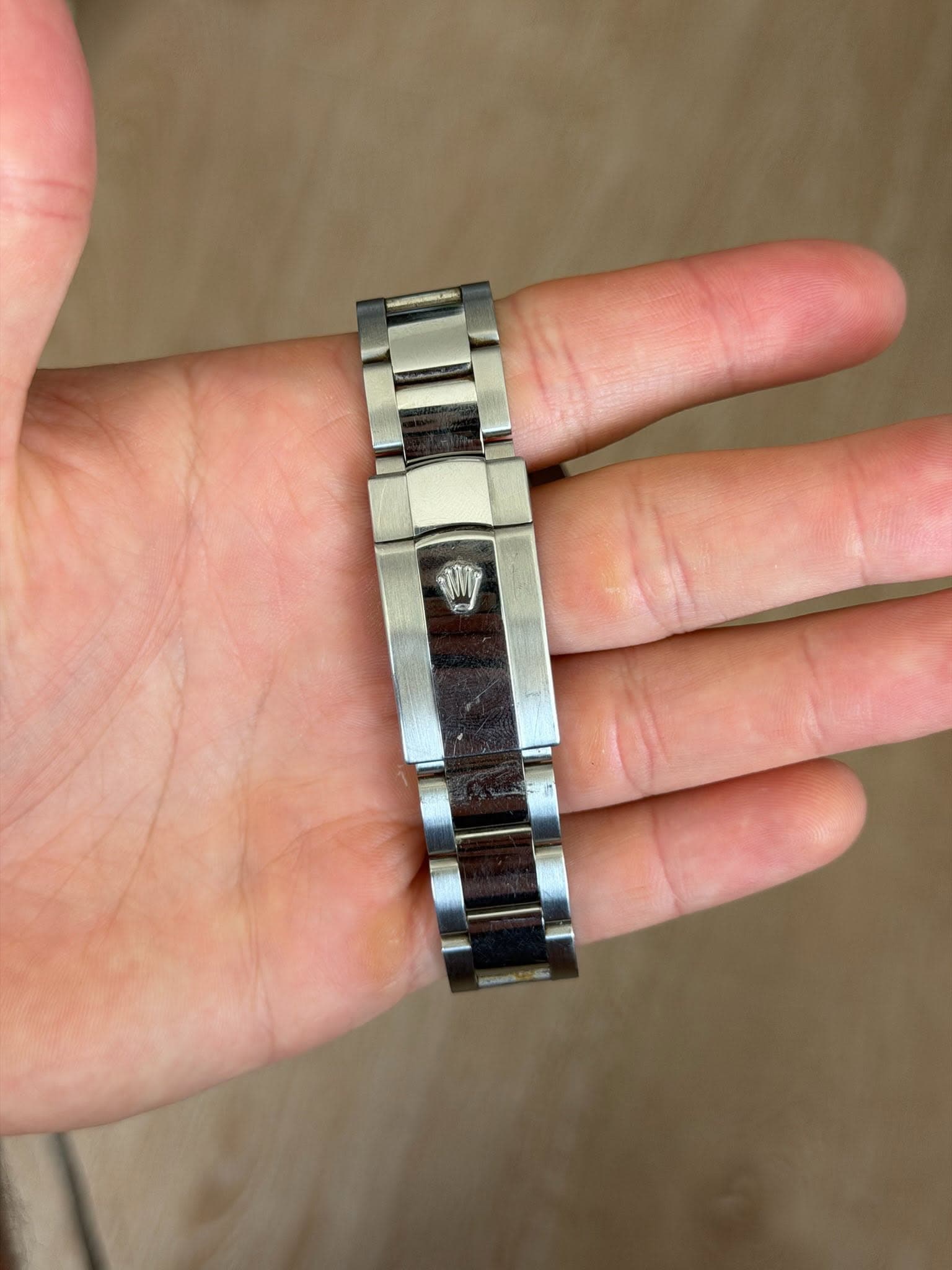 May be an image of wrist watch